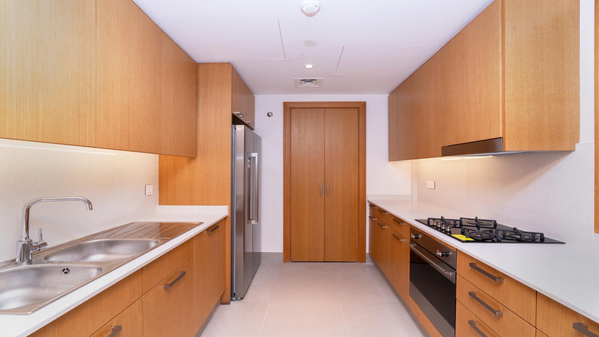 Furnished living room in 3-bed apartment, Opera Grand, Downtown Dubai, with modern decor and balcony