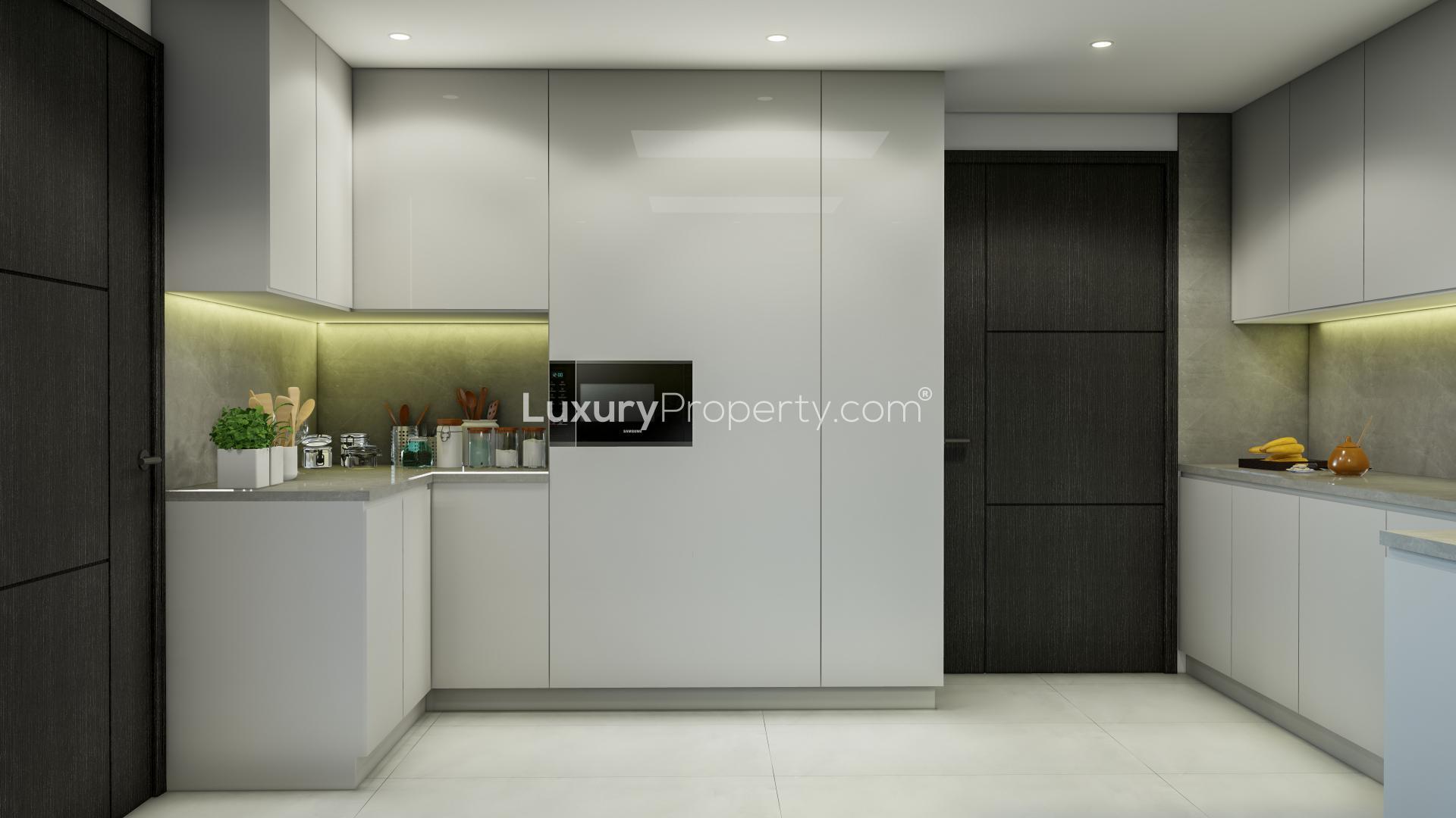 Modern kitchen in Paragon Residence apartment, Business Bay, featuring sleek cabinetry and premium finishes
