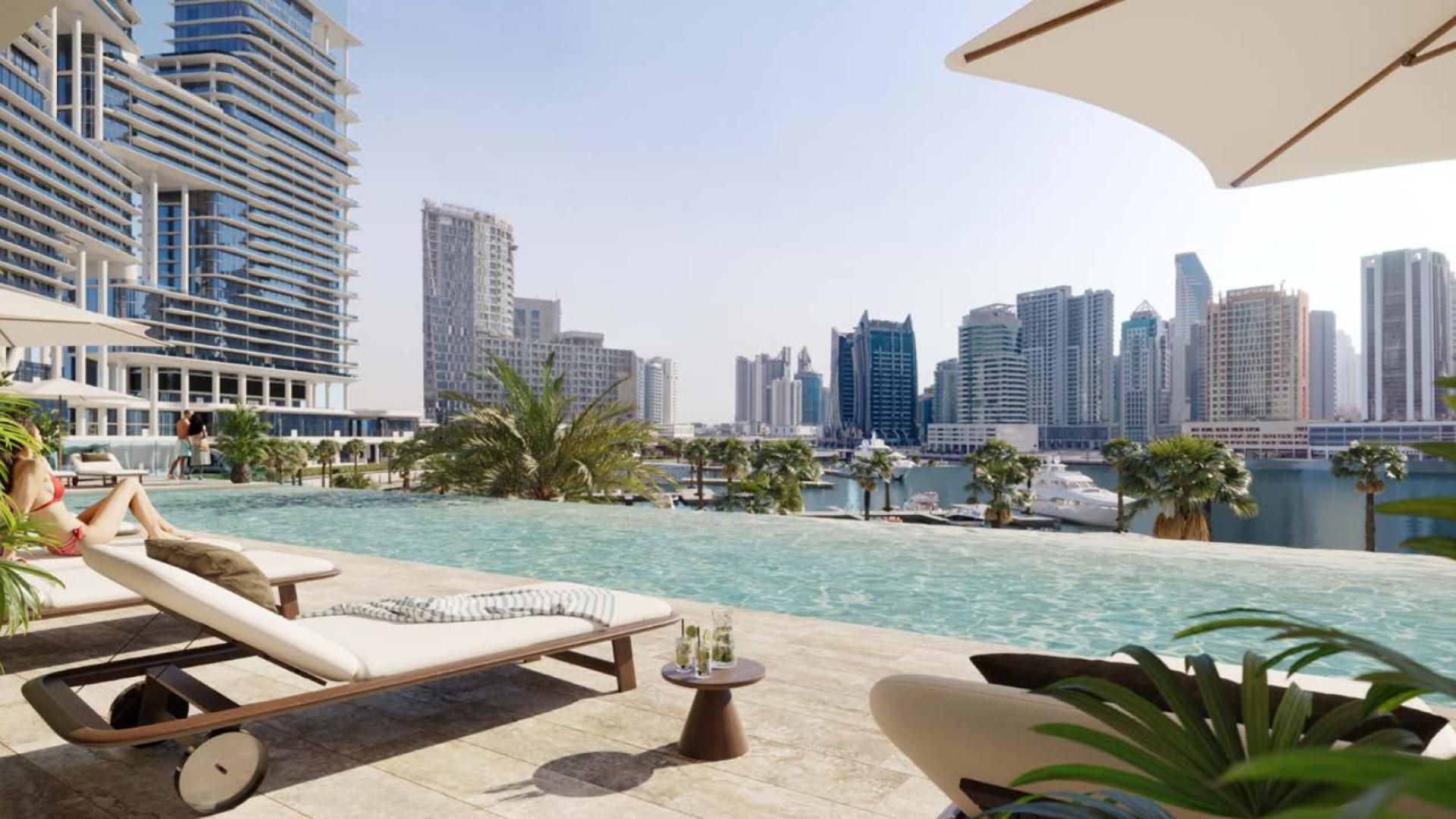 High-floor apartment terrace with pool and city view at The Vela Dorchester Collection