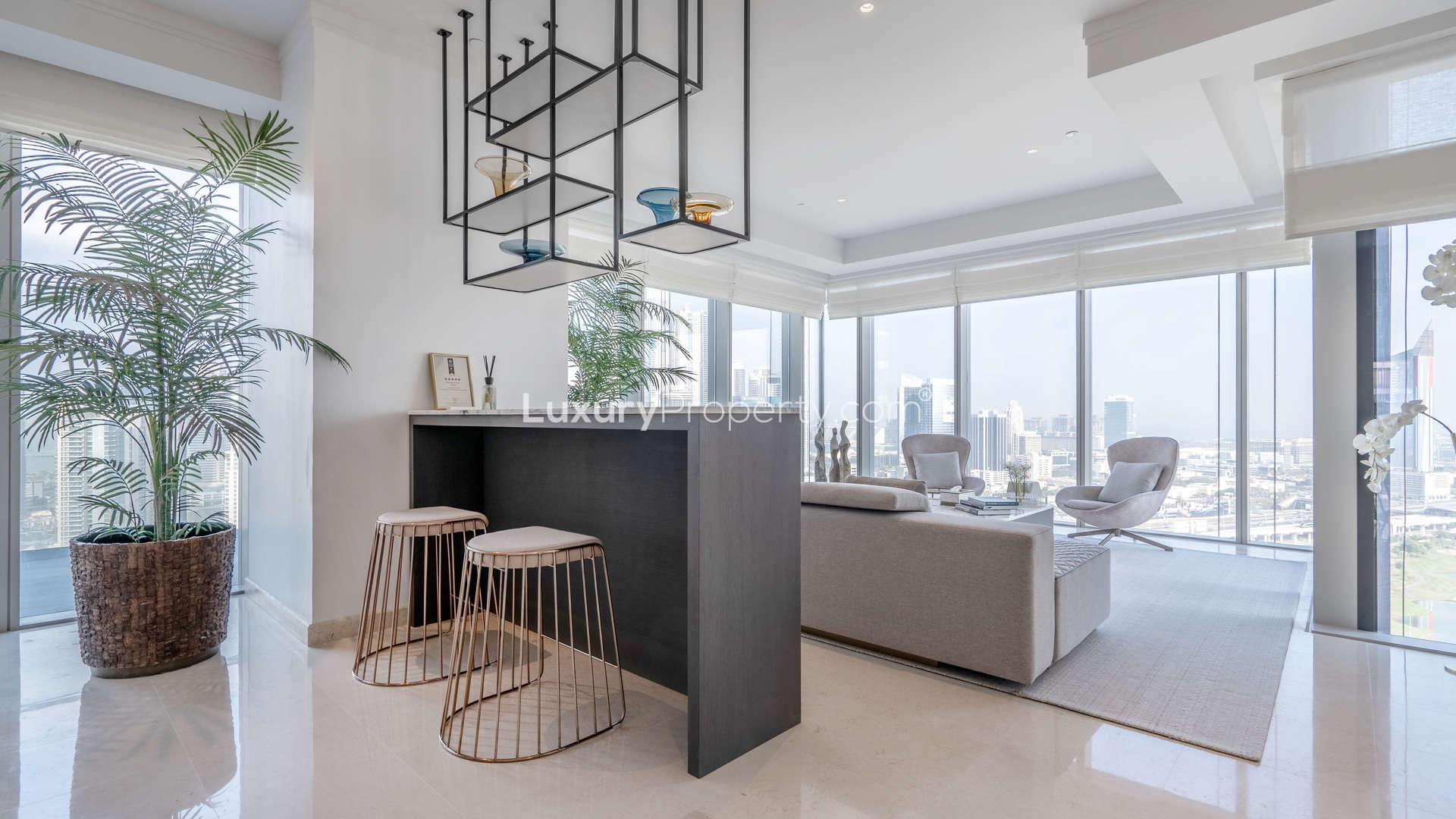 Luxurious dining and living area in three-bedroom apartment, The Residences JLT, Dubai