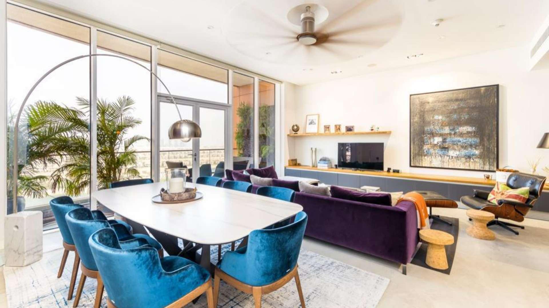 Modern kitchen and living area in upgraded Palm Jumeirah apartment, Tiara Residences, Atlantis views