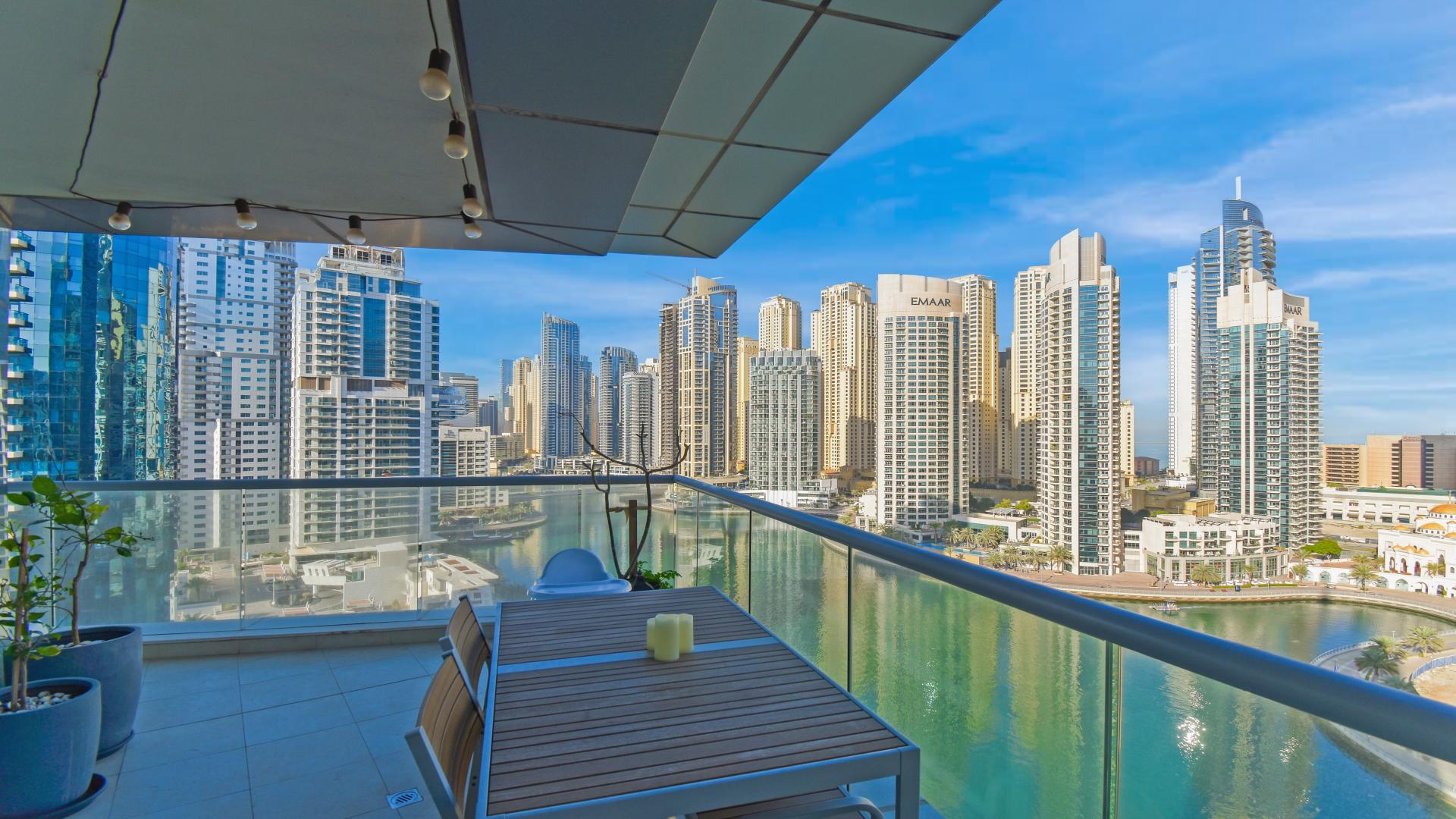 Upgraded 3-bedroom apartment living room with marina view in Trident Bayside, Dubai Marina