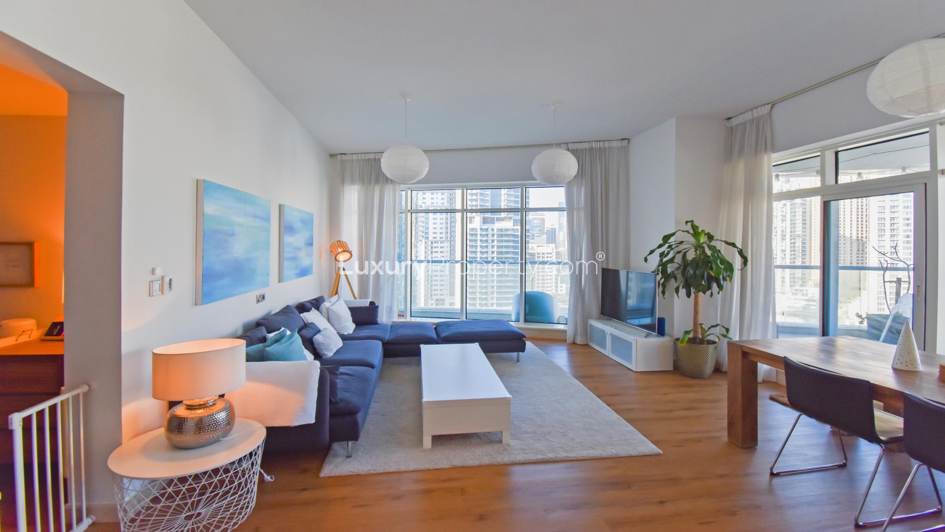 Infinity pool with Dubai Marina skyline view from Trident Bayside apartment balcony