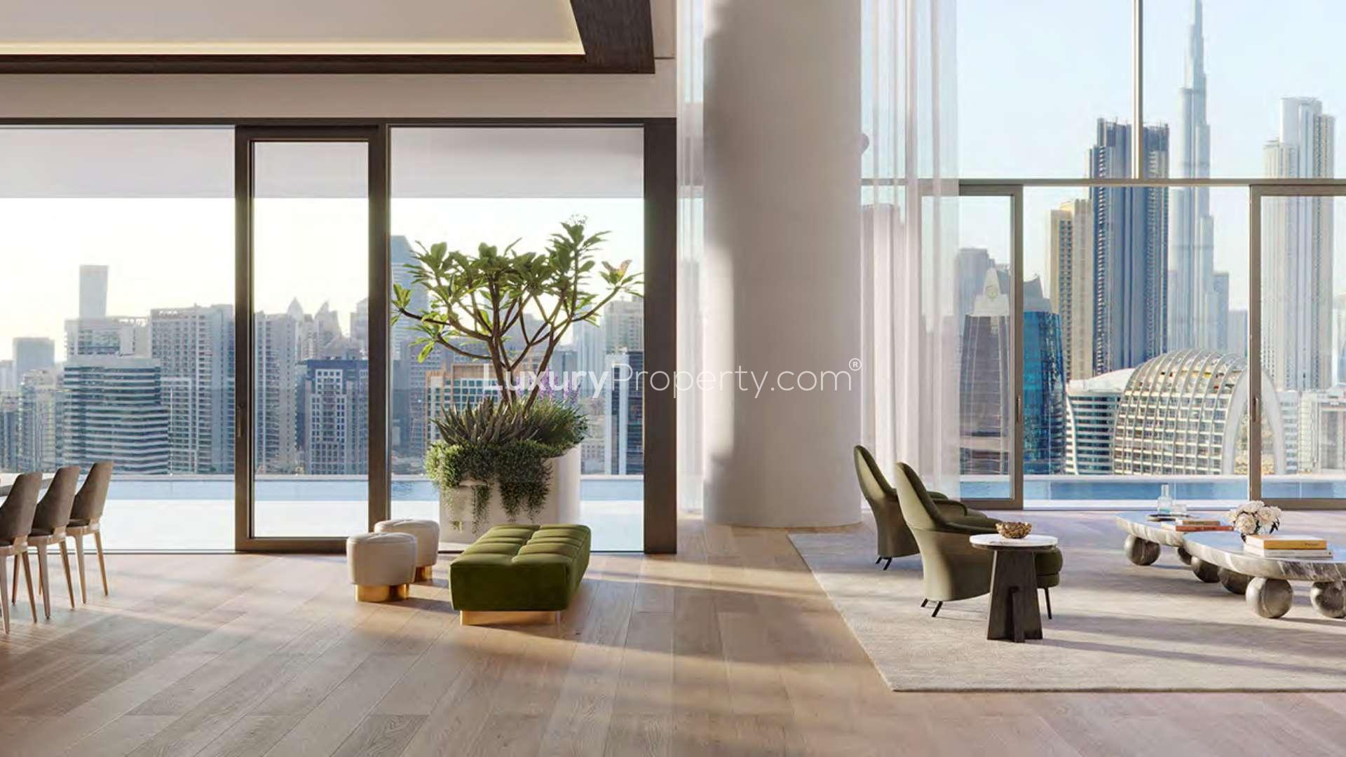 3-bedroom apartment exterior at Vela Dorchester Collection, Business Bay, overlooking marina at sunset