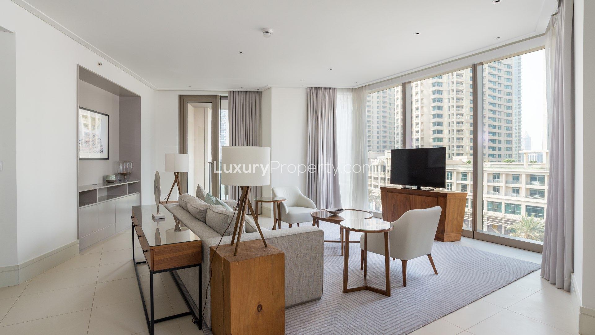 Modern kitchen with bar seating in Vida Residence Downtown Dubai apartment for sale