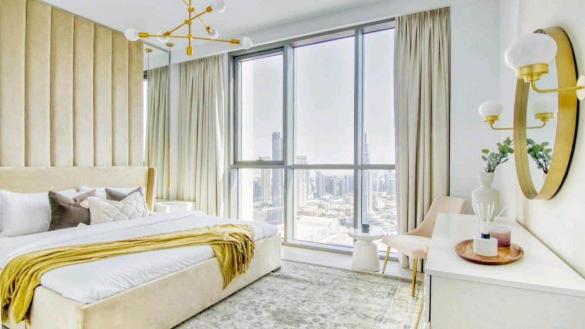 High floor furnished bedroom with Burj Khalifa views in Downtown Dubai apartment