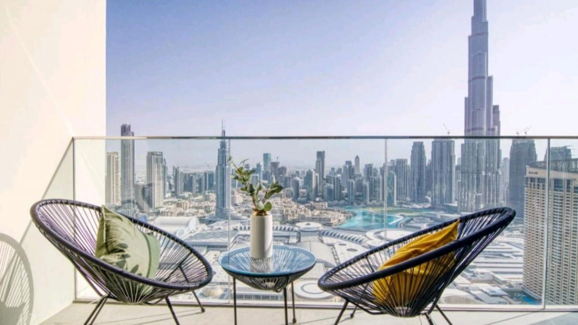 High-floor apartment pool with Burj Khalifa views in Downtown Views II, Downtown Dubai