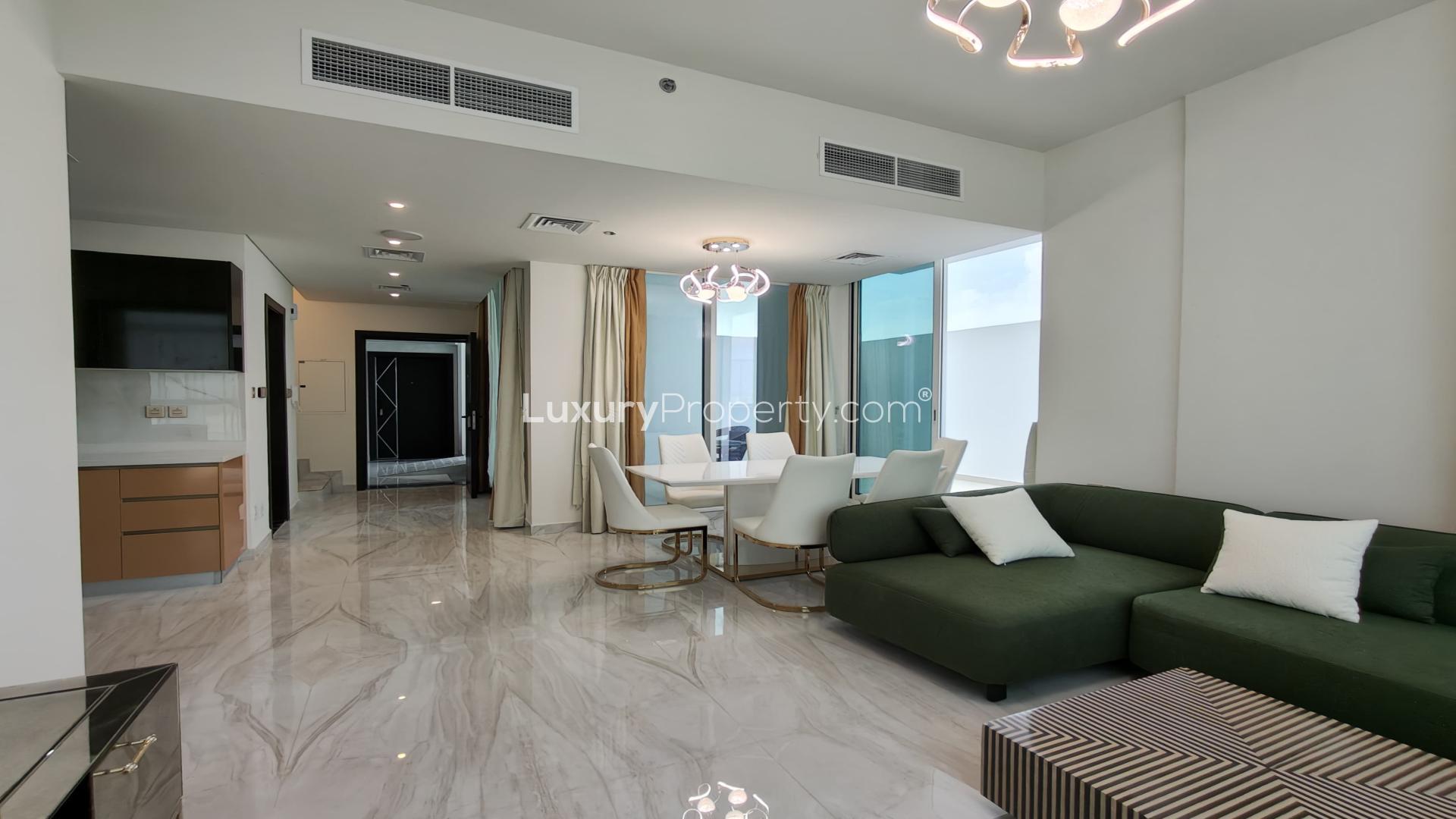 "Luxury penthouse pool view at Gemz by Danube, Al Furjan, available for rent.",Modern living room in Gemz by Danube penthouse, Al Furjan, featuring elegant decor and furniture