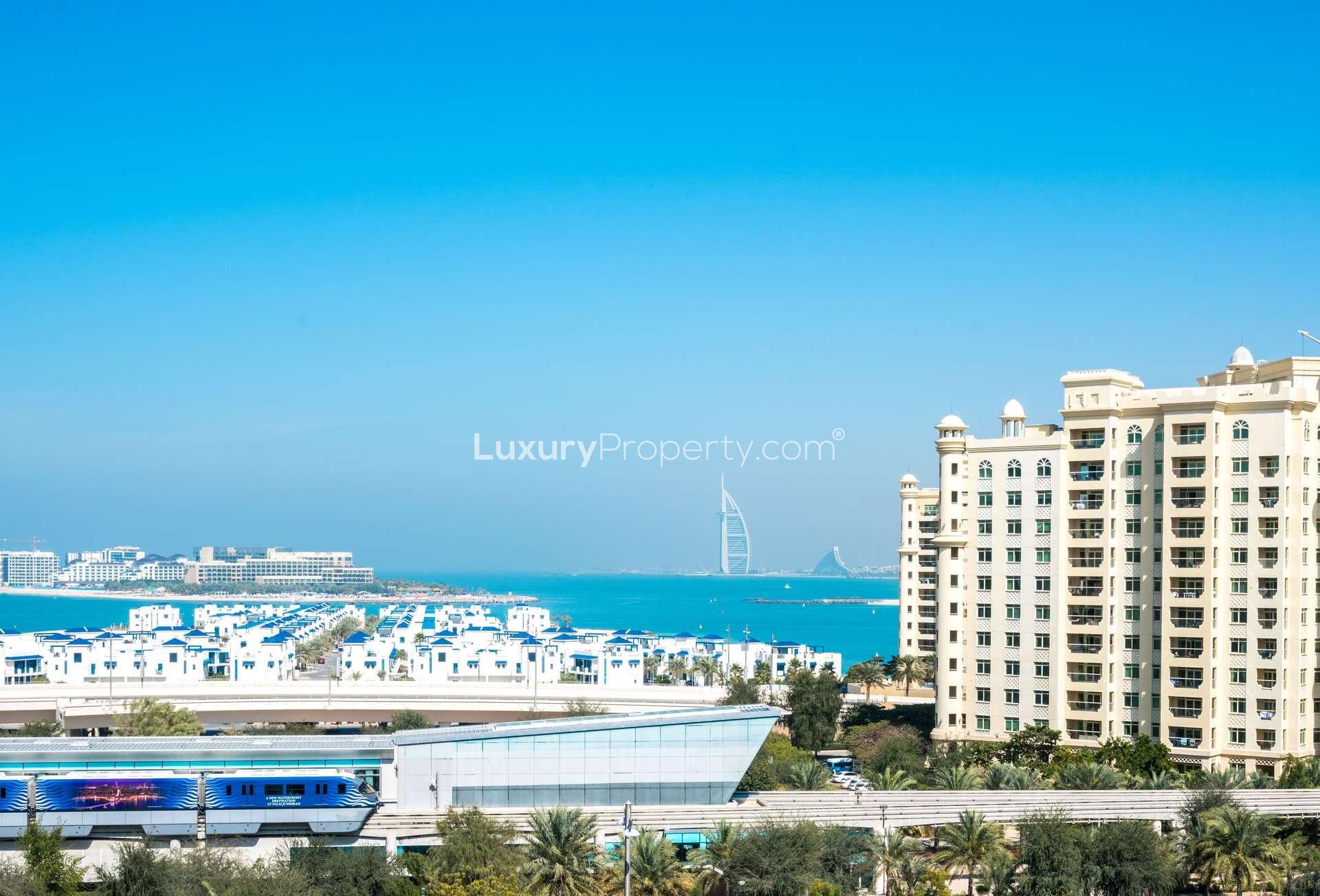 Hallway view of Soho Palm Jumeirah penthouse with modern decor and dining area