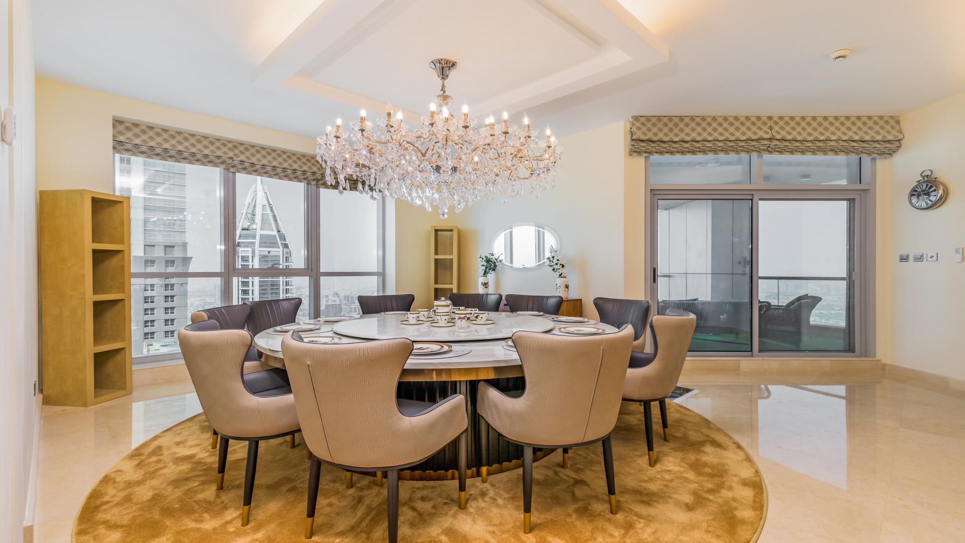 Entrance of luxury duplex penthouse with elegant staircase in Torch Tower, Dubai Marina