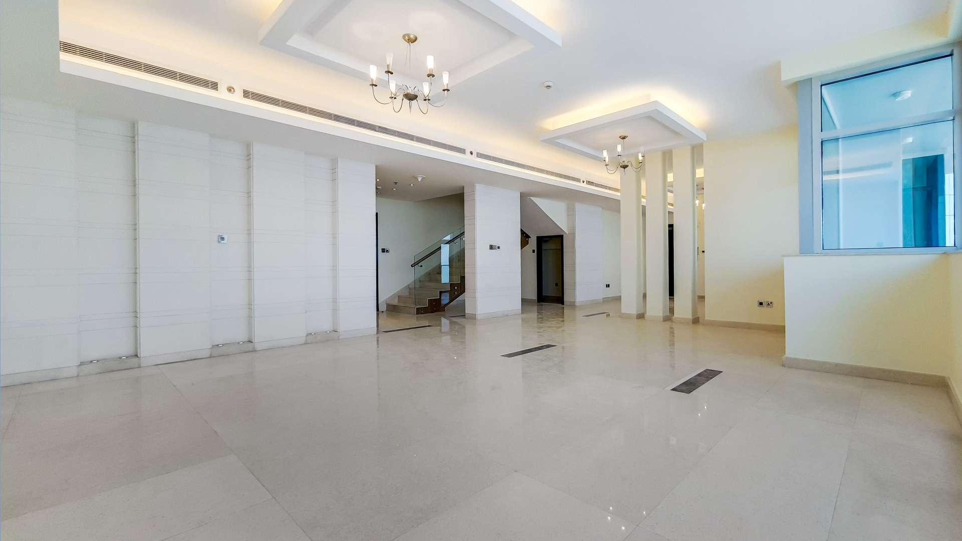 "Spacious living area in high-floor Dubai Marina penthouse with modern finishes and large windows.",Spacious living area in high-floor duplex penthouse, Dubai Marina, The Torch, for rent