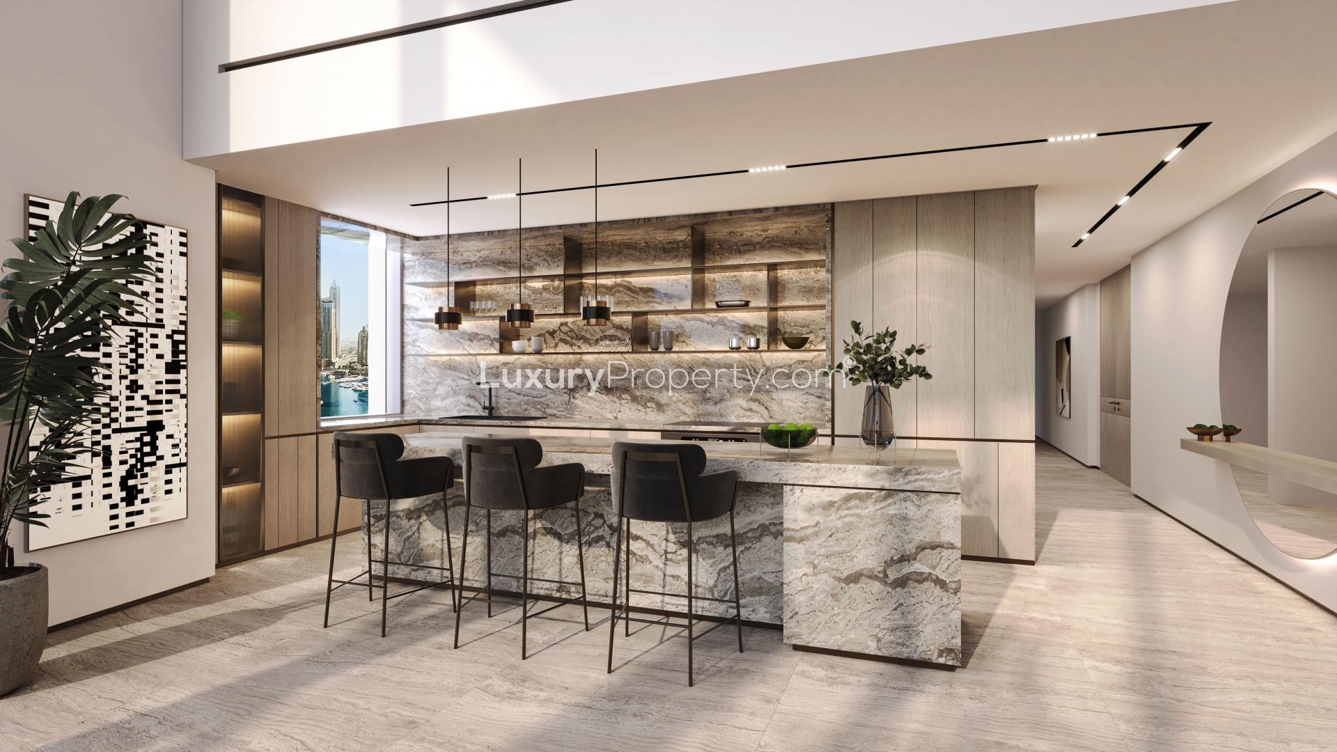 Duplex penthouse terrace with panoramic Dubai Marina views, modern seating, and lush greenery