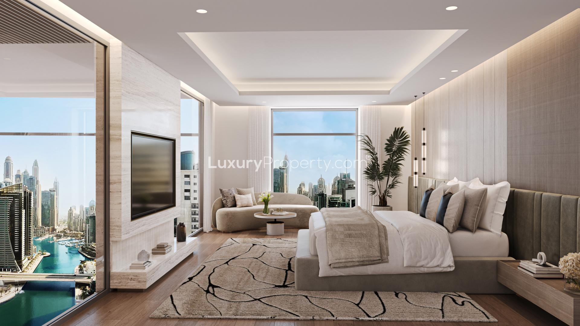 Modern kitchen in Dubai Marina penthouse with marble island and panoramic views