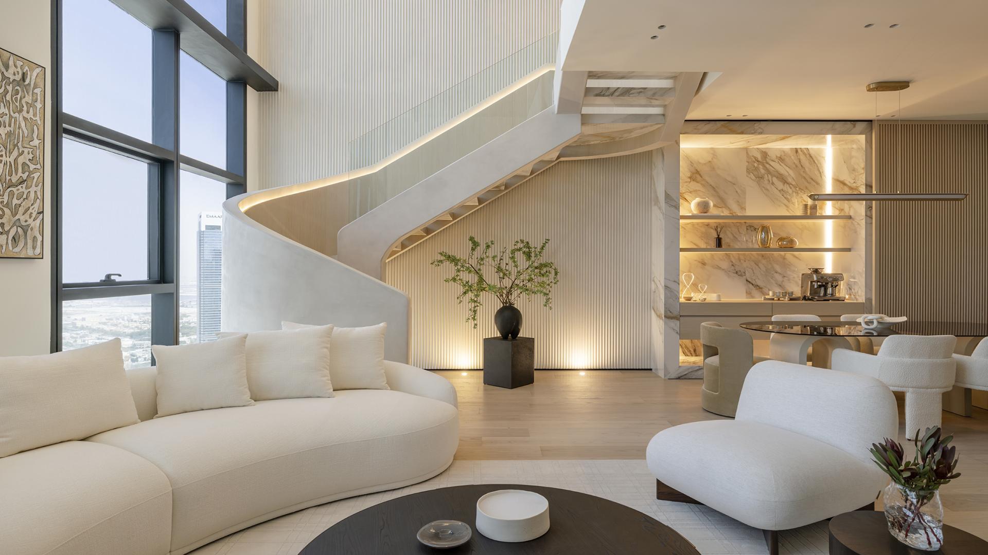 Stylish modern kitchen and dining area in furnished duplex penthouse, Central Park Tower DIFC