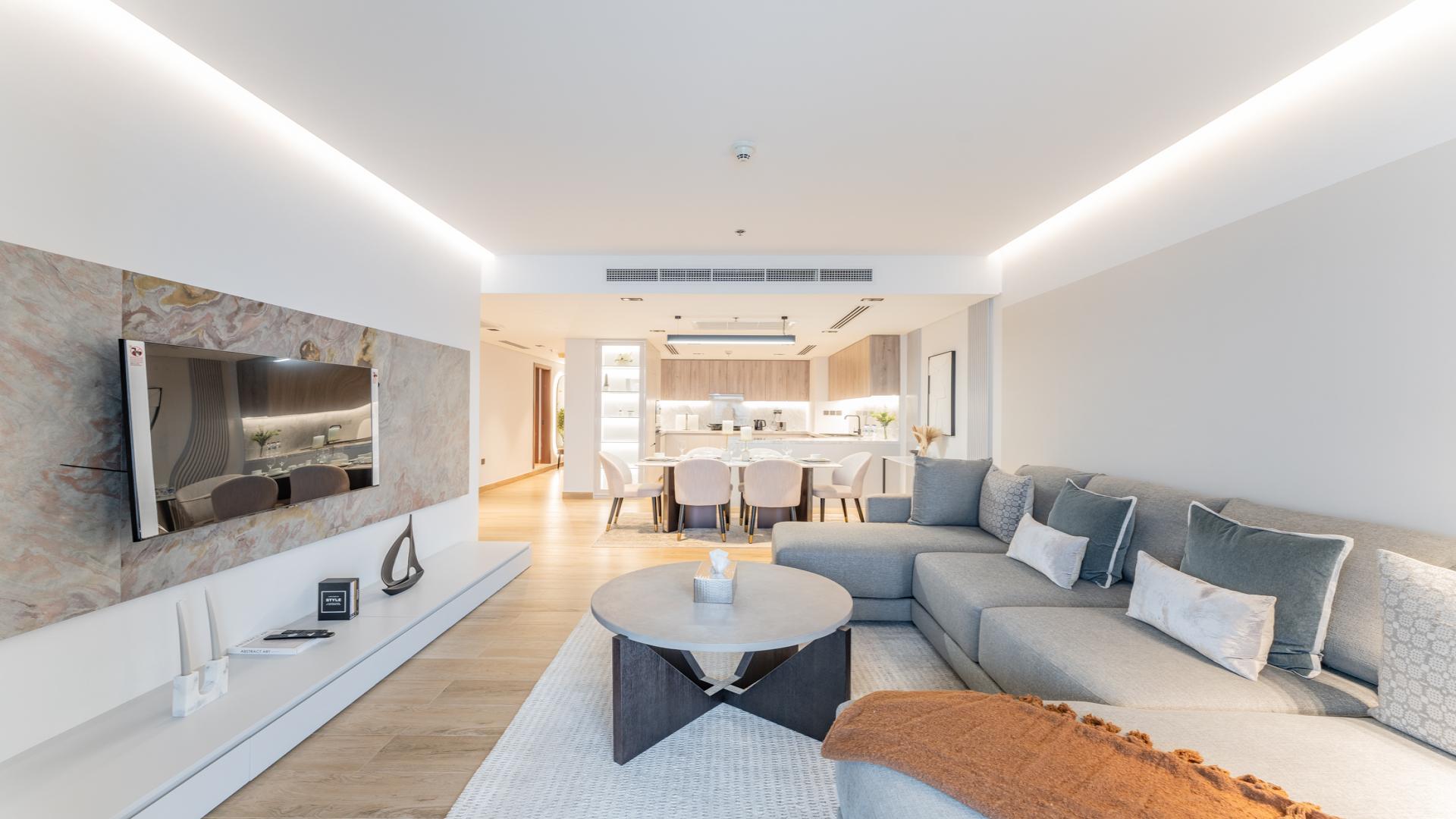 Luxury penthouse living room with ocean view terrace at Palm Jumeirah, The Royal Amwaj