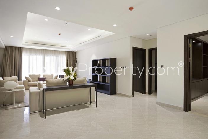 Modern living room in Palm Jumeirah penthouse, featuring elegant decor and natural light