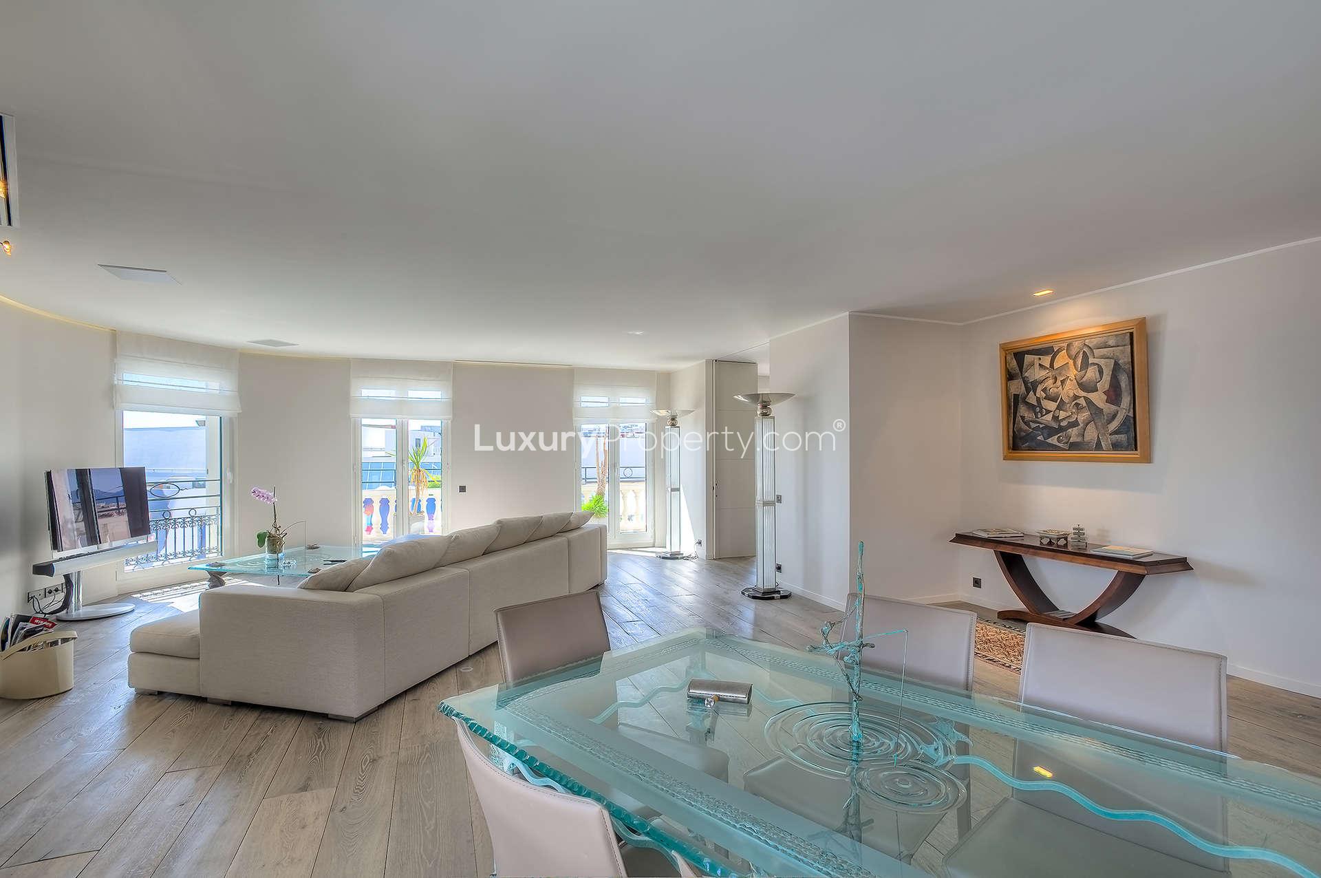 Luxurious bathroom in Cannes penthouse, featuring modern vanity and bathtub, French Riviera