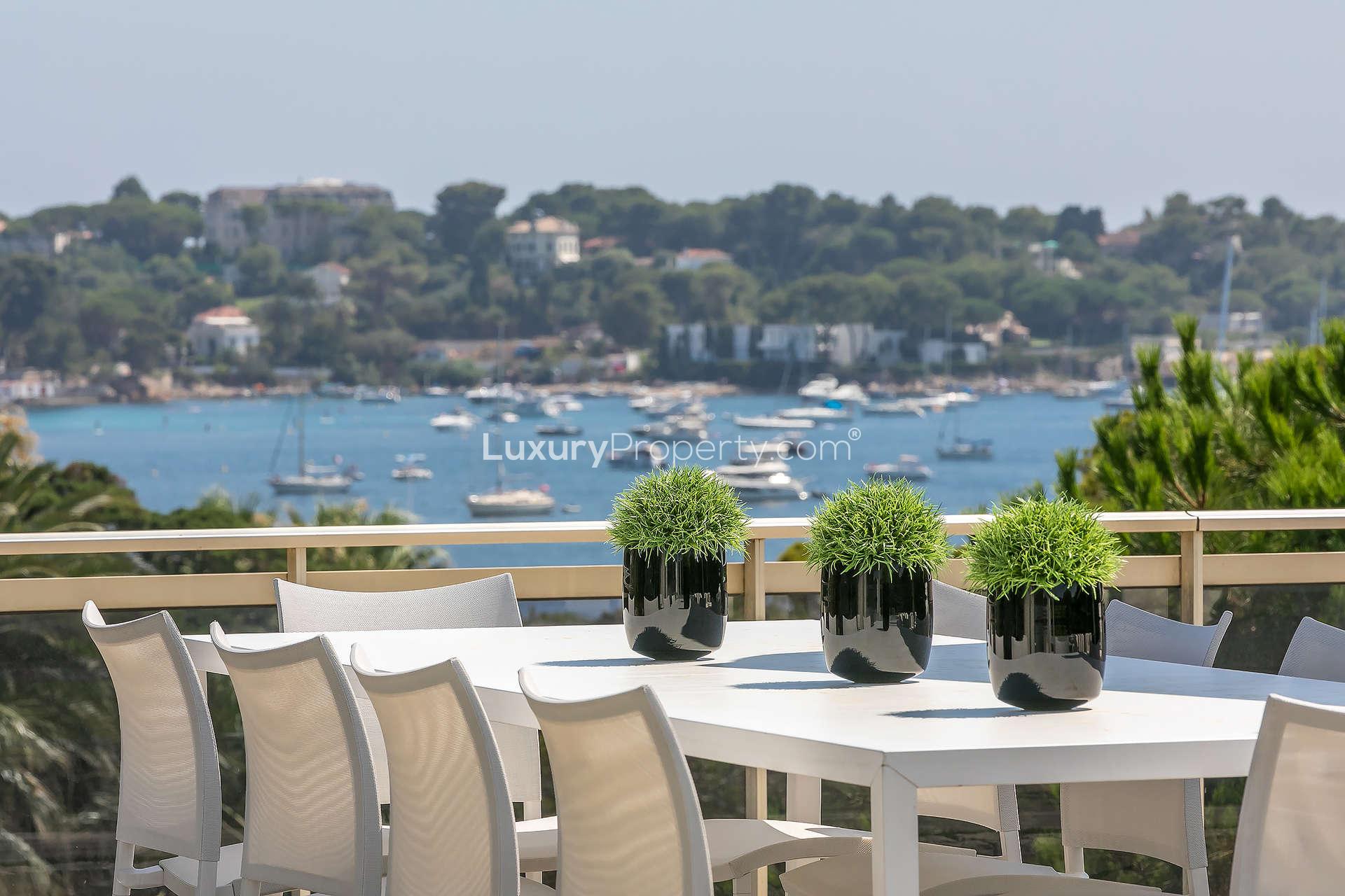 Luxurious penthouse pool and patio in Cap d'Antibes, French Riviera, with scenic views
