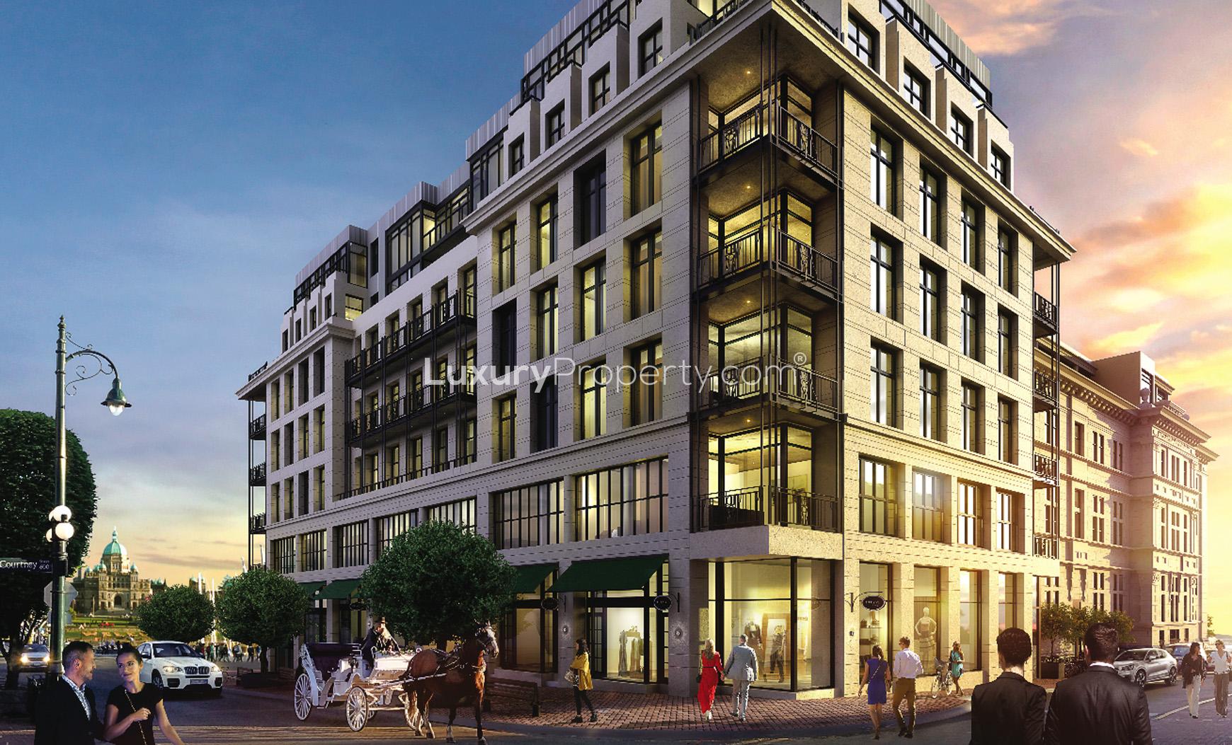 Luxurious bathroom in Victoria penthouse with marble tiles and glass shower enclosure