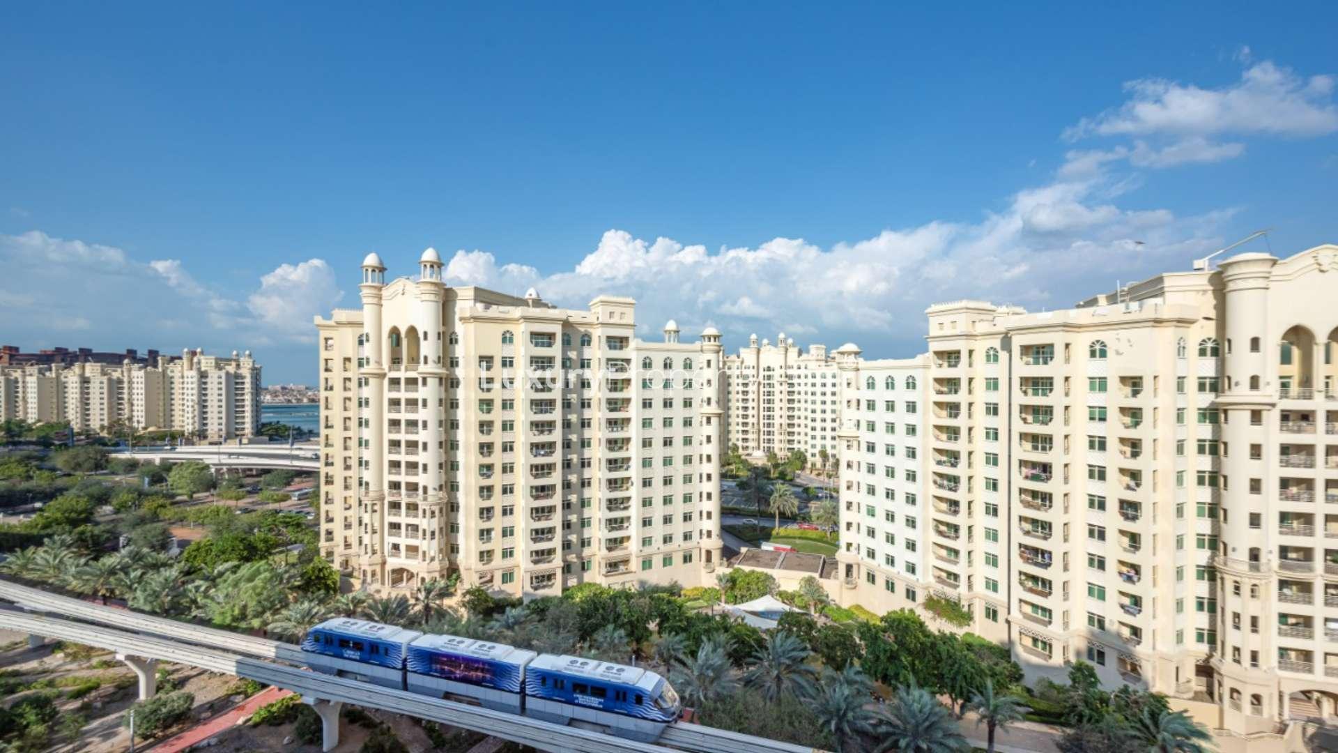Spacious park-facing penthouse view in Golden Mile, Palm Jumeirah with monorail in foreground