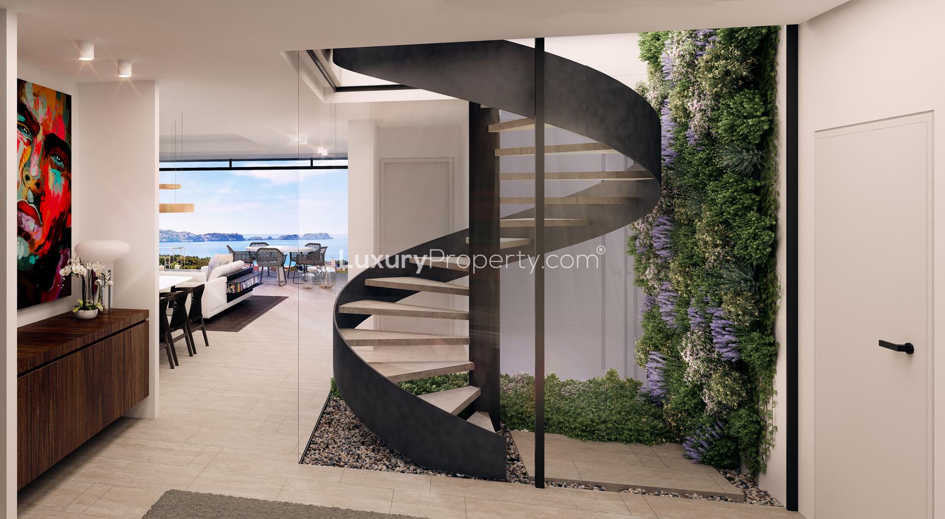 Aerial view of luxurious penthouse community at Sa Puntassa Mar, Mallorca, surrounded by nature