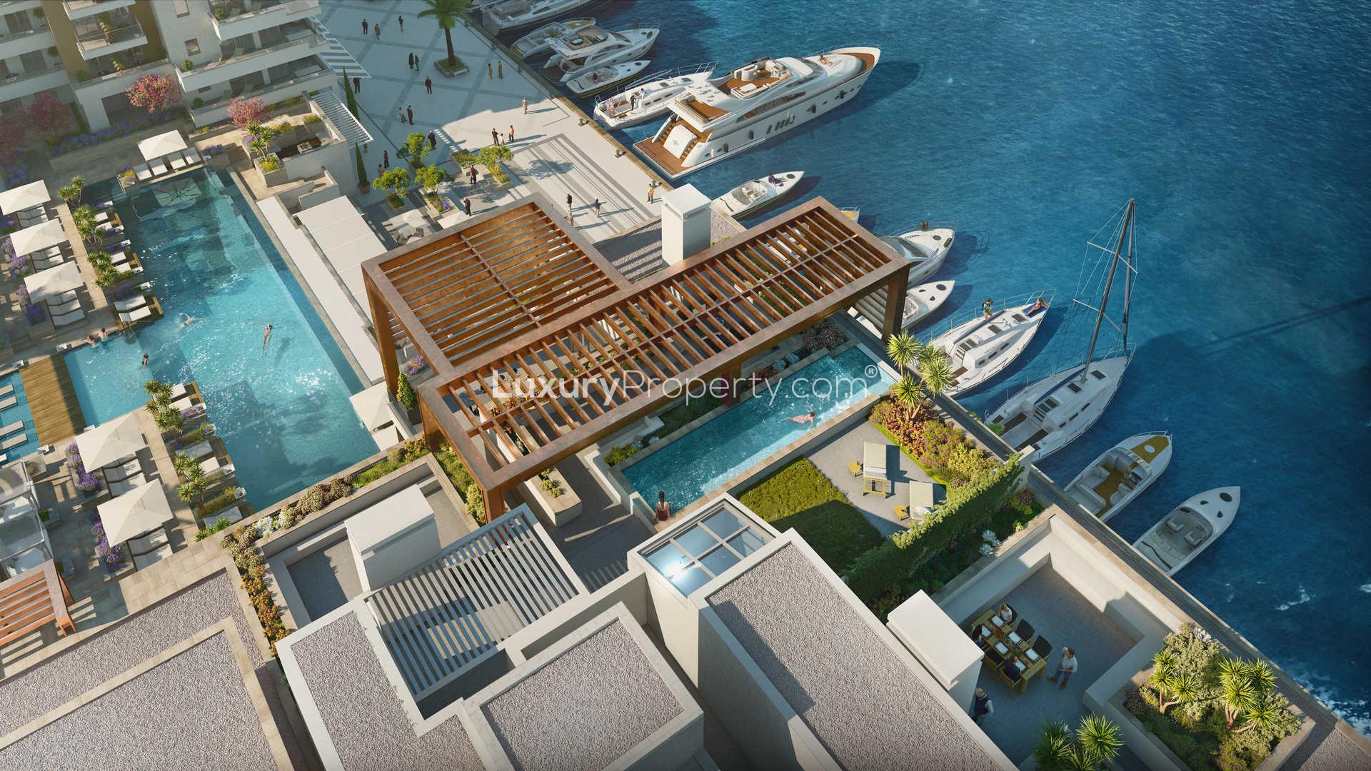 Outdoor pool area at Regent Pool Club Residences, Porto Montenegro penthouse community