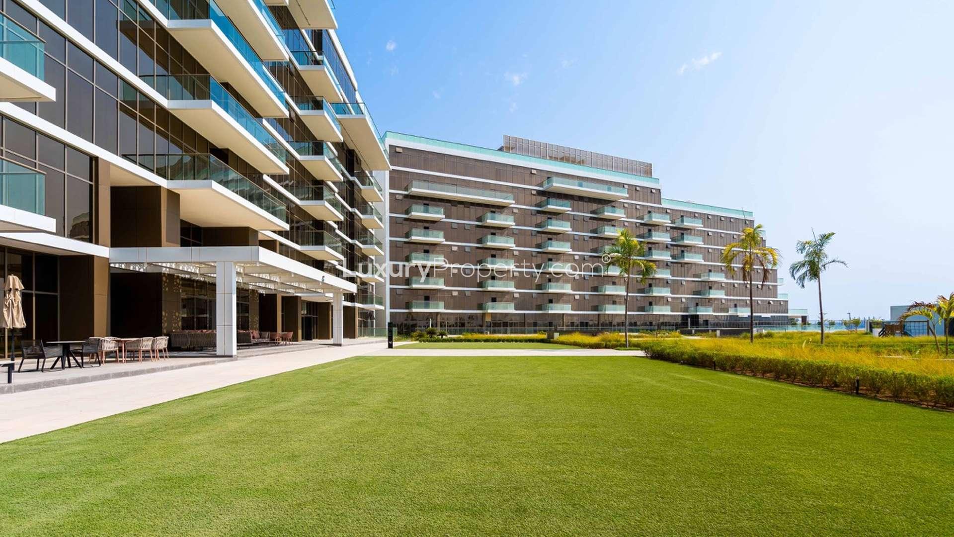 Exterior view of The 8, Palm Jumeirah penthouse with lush landscaping and modern architecture