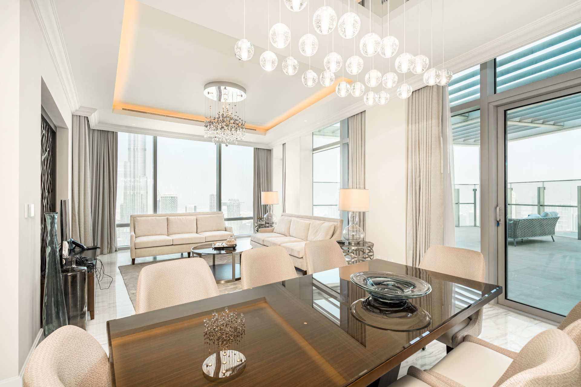 Luxurious living room in Sky Collection Penthouse, Downtown Dubai, with private terrace view