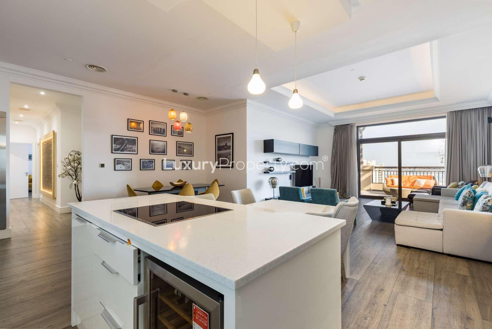 Modern open-plan living area in renovated Fairmont penthouse, Palm Jumeirah