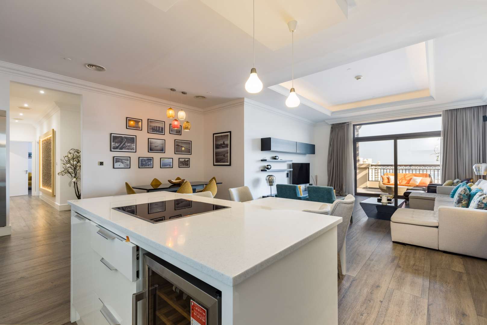 Modern open-plan living area in renovated Fairmont penthouse, Palm Jumeirah