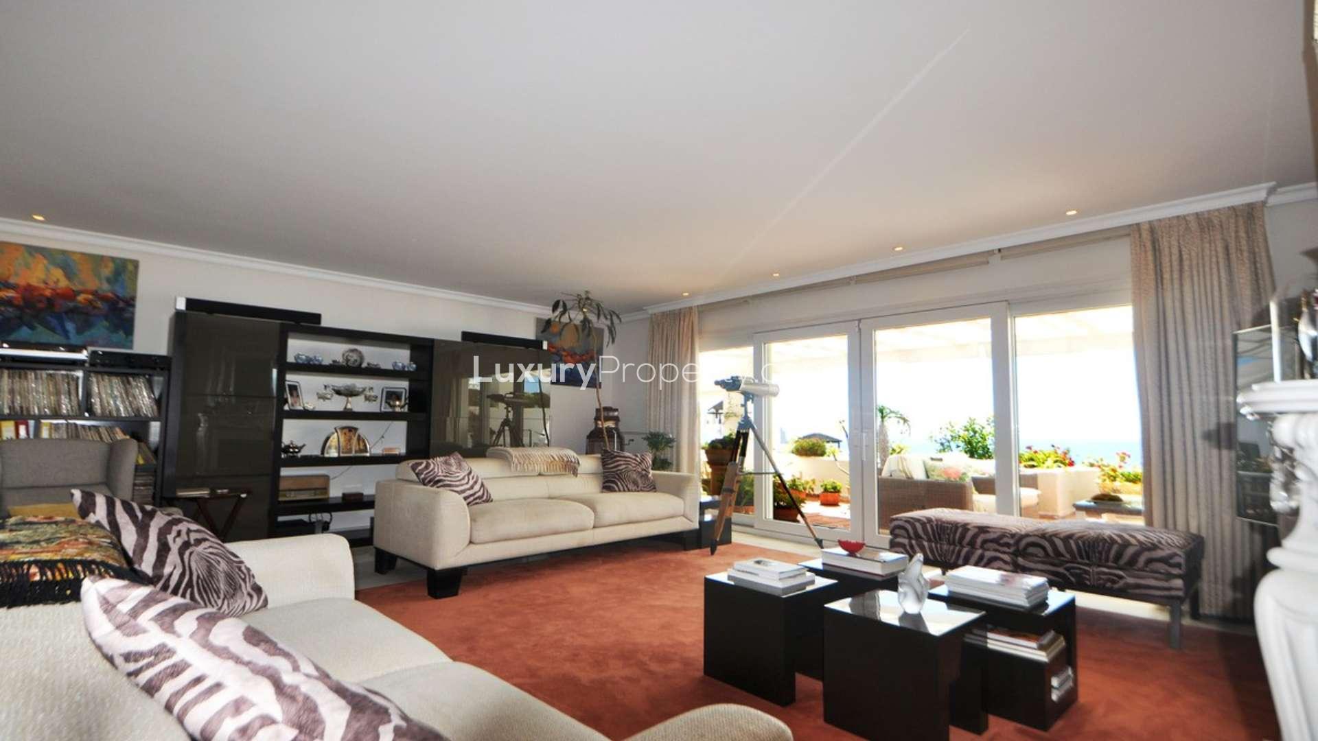 Luxurious living room in Torremolinos penthouse with sea view and elegant decor