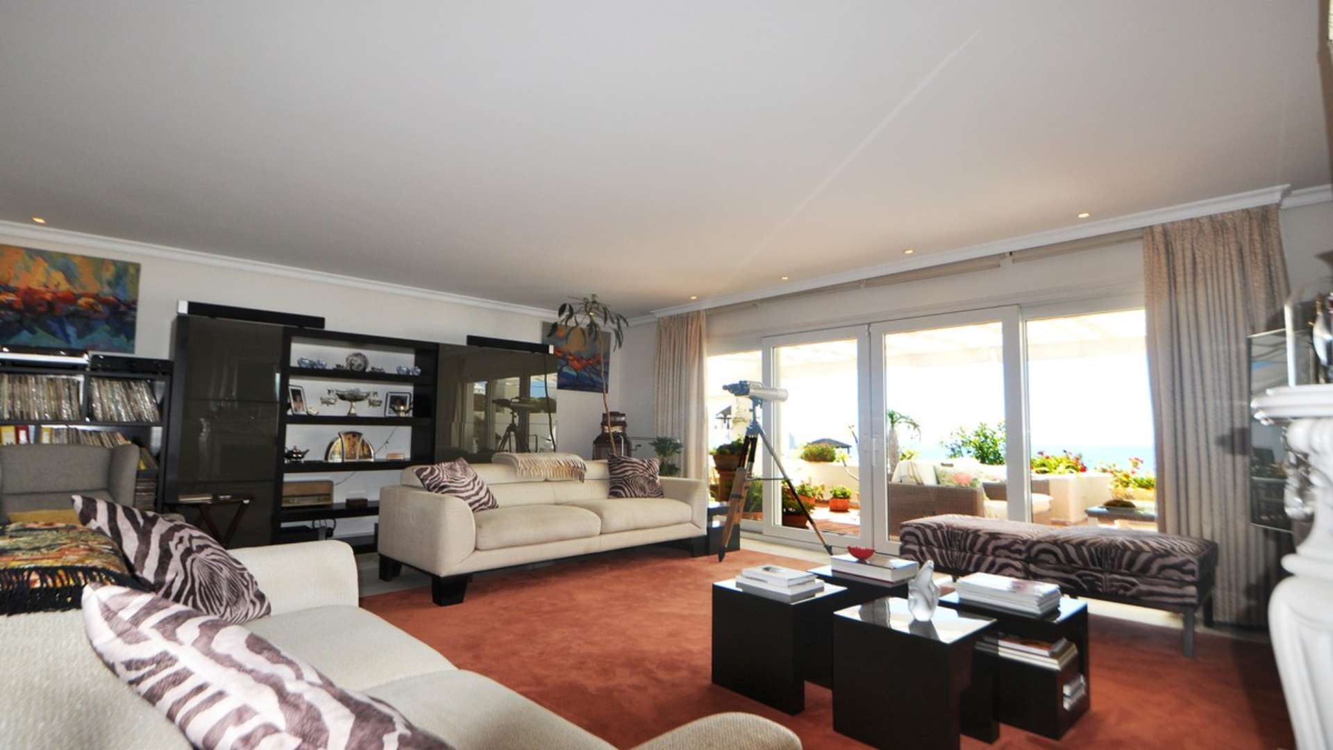 Luxurious living room in Torremolinos penthouse with sea view and elegant decor