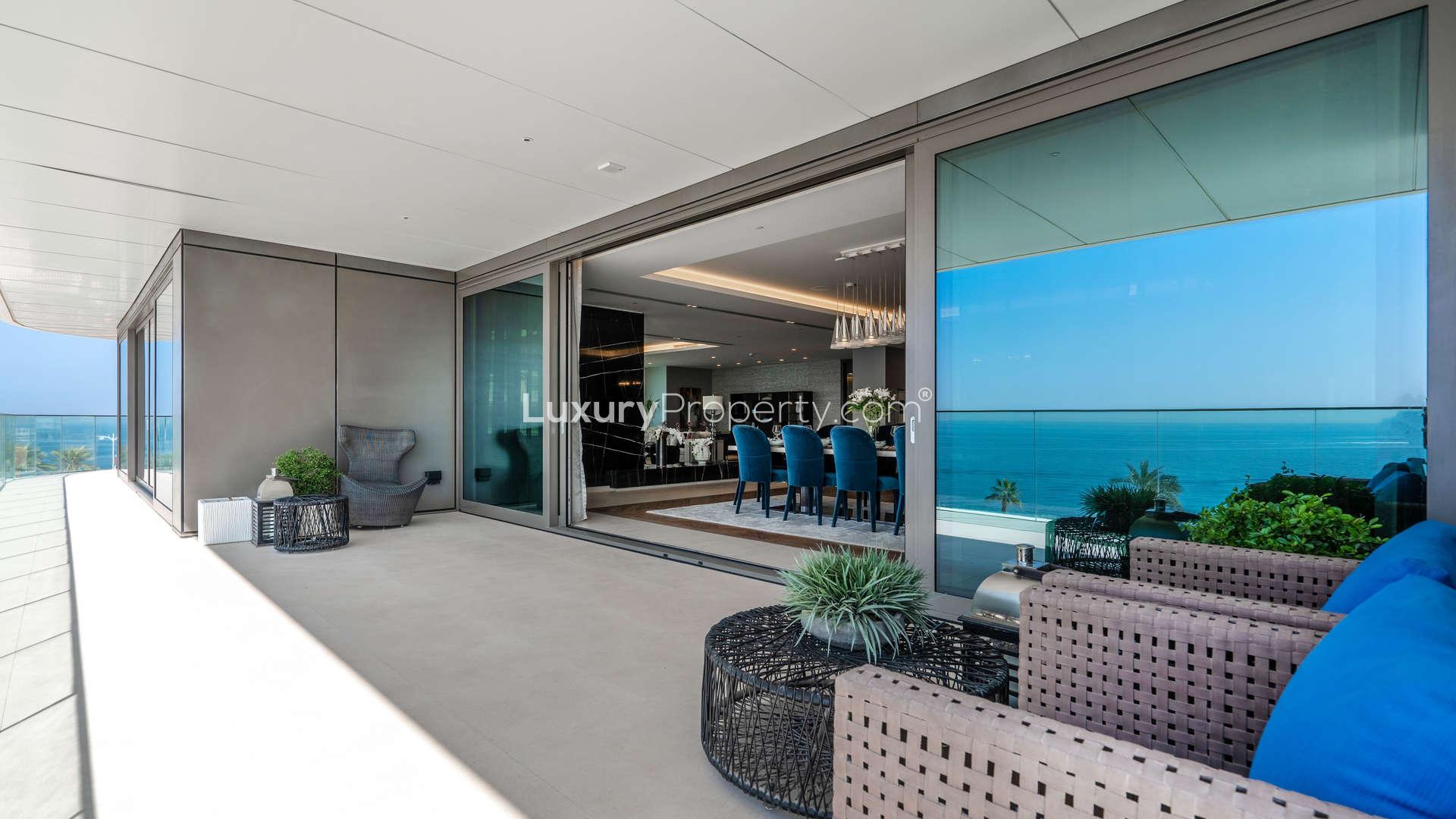 Modern kitchen interior in luxurious Palm Jumeirah penthouse, W Residences, featuring sleek design