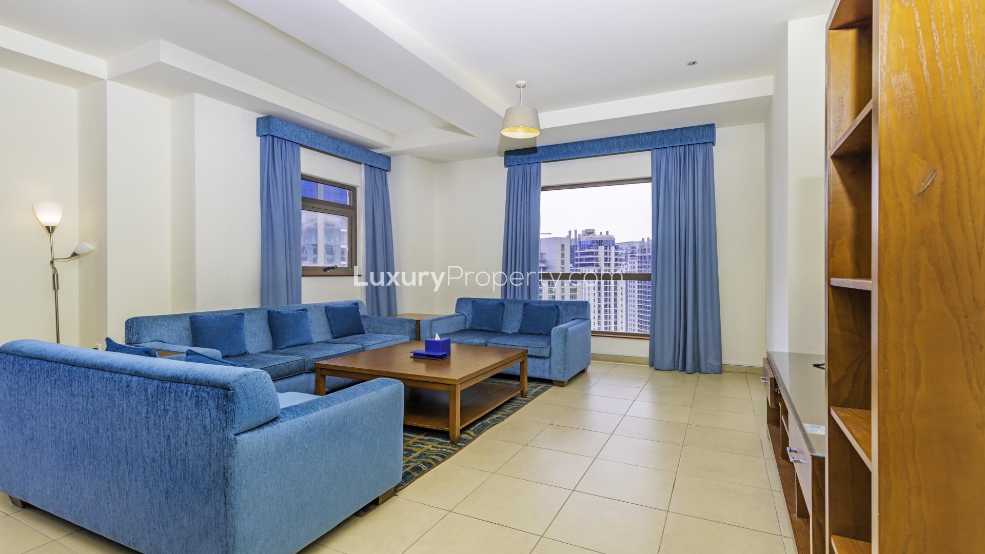 Spacious living room in serviced apartment, blue sofas, Jumeirah Beach Residence, Amwaj