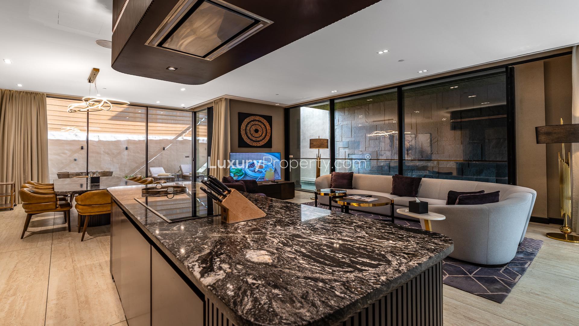 Luxurious dining and living area in Al Sufouh's Biltmore Residences serviced apartment