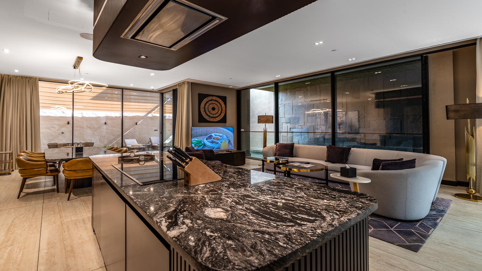 Luxurious dining and living area in Al Sufouh's Biltmore Residences serviced apartment