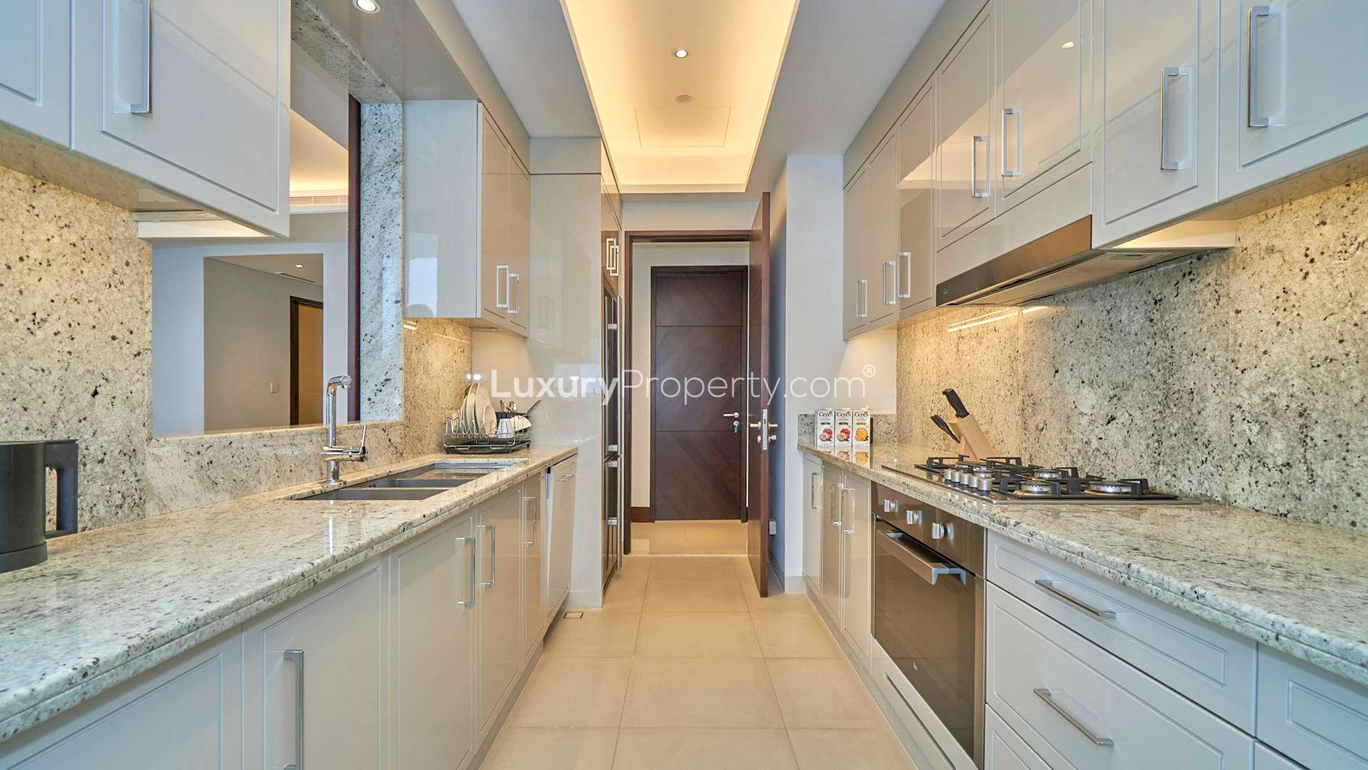 Modern living and dining area in 3-bedroom apartment, The Address Sky Views, Downtown Dubai