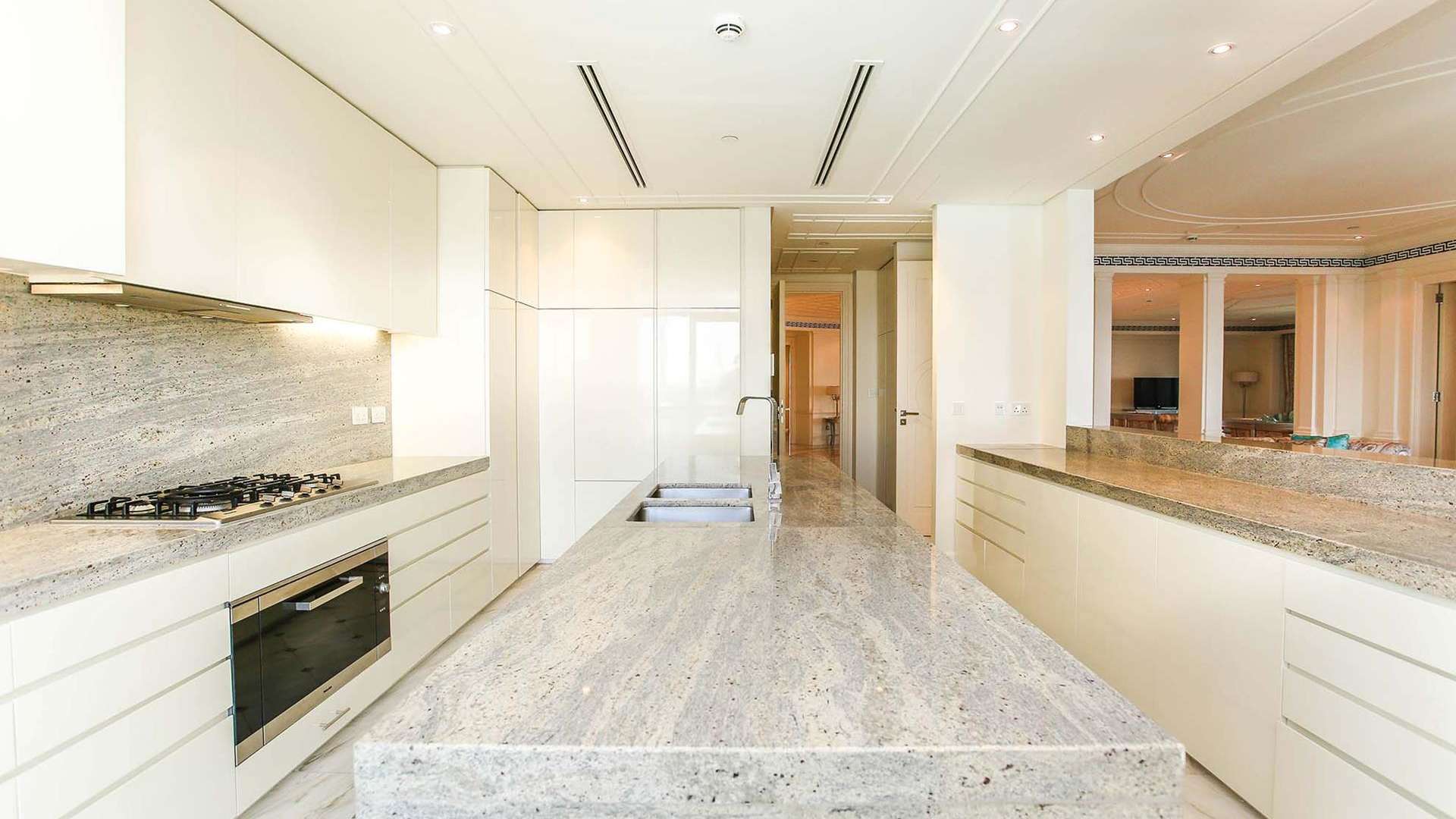 "Spacious balcony view at three-bedroom apartment, Palazzo Versace, Culture Village, Dubai for rent.",Luxury kitchen in three-bedroom apartment, Palazzo Versace, Culture Village, available for rent