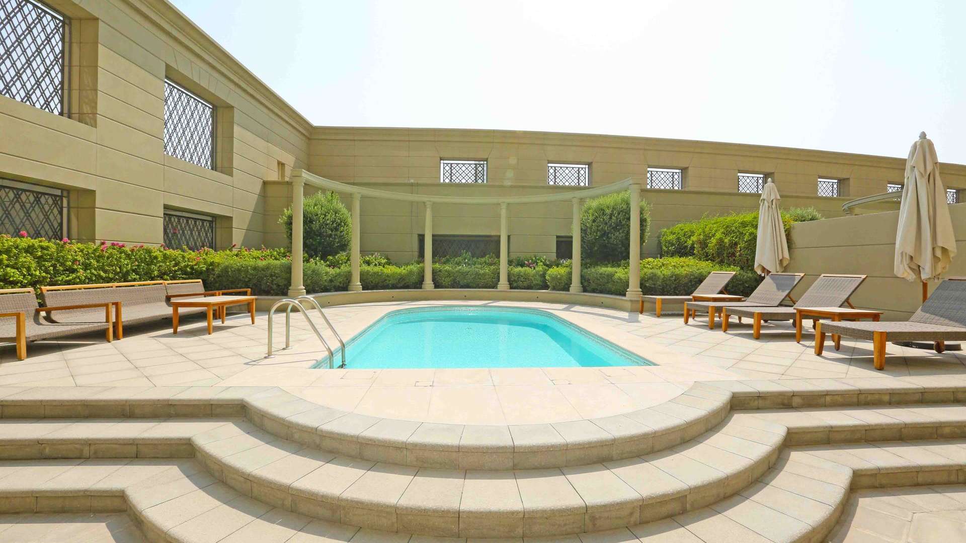 Luxurious marble bathroom with mosaic details in Palazzo Versace apartment, Culture Village