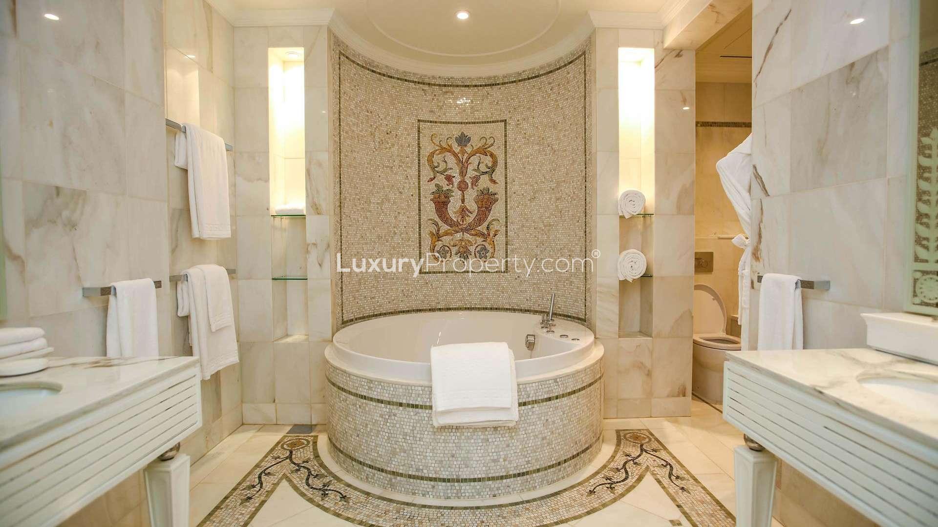 Elegant dining area in luxury apartment at Palazzo Versace, Culture Village, marble flooring