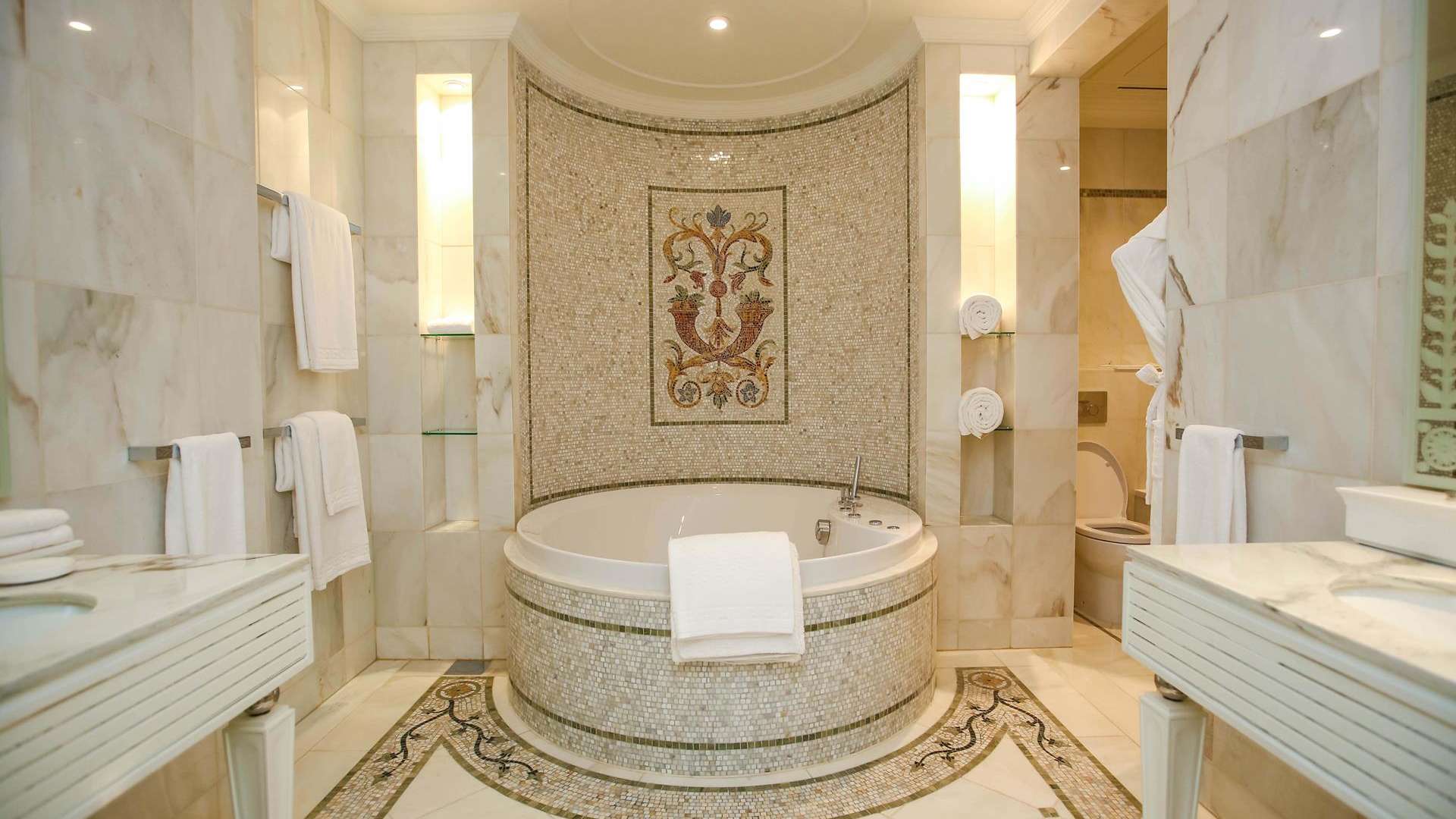 Elegant dining area in luxury apartment at Palazzo Versace, Culture Village, marble flooring