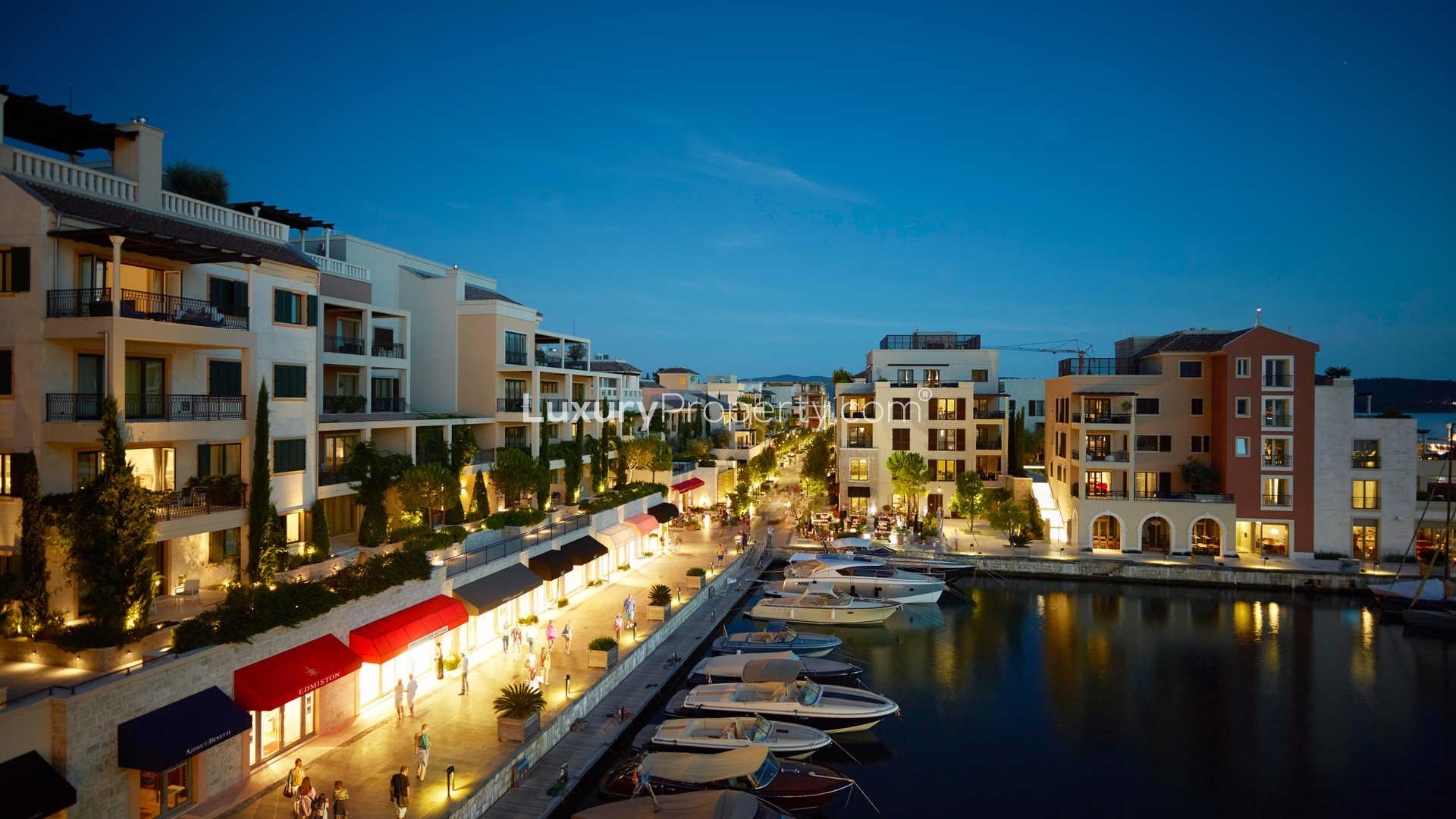 Luxurious terrace view at Regent Pool Residence, Porto Montenegro, with yacht and friends