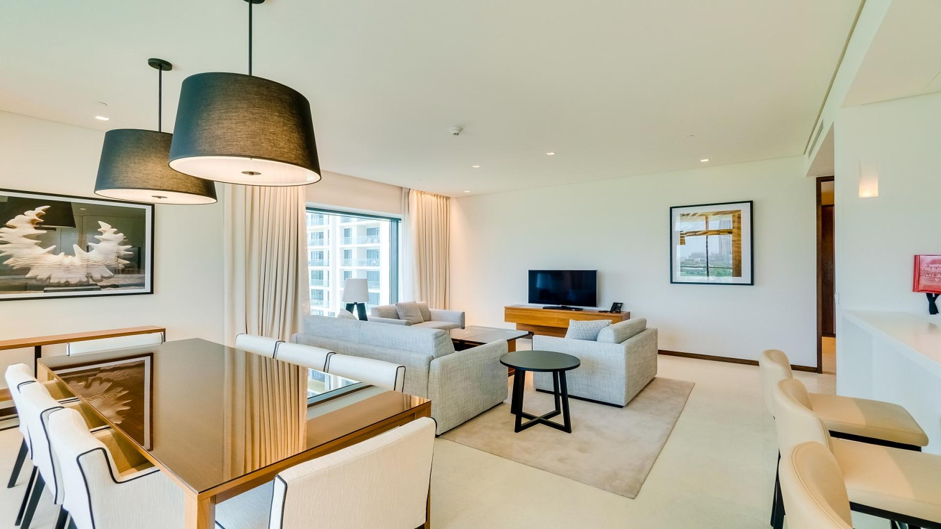 Balcony view from spacious 3-bedroom apartment in Vida The Hills, overlooking cityscape and greenery