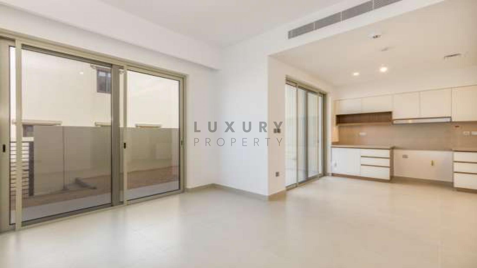 Modern 3-bedroom townhouse exterior in Camelia, Arabian Ranches 2, available for rent