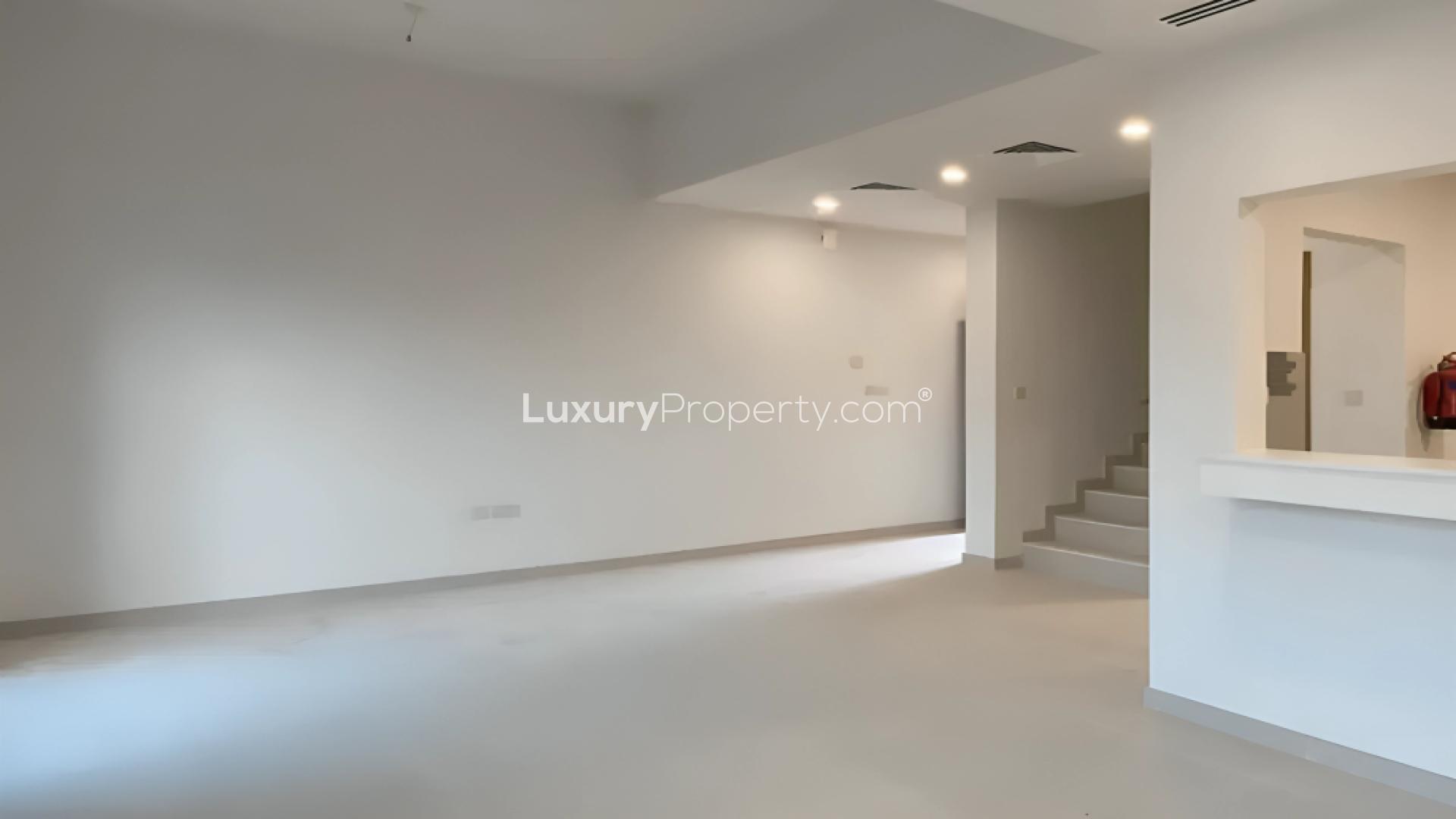 "Spacious living area in Amaranta townhouse, Villanova, featuring open layout and modern design.",Spacious living area in 3-bedroom townhouse, Amaranta, Villanova for rent