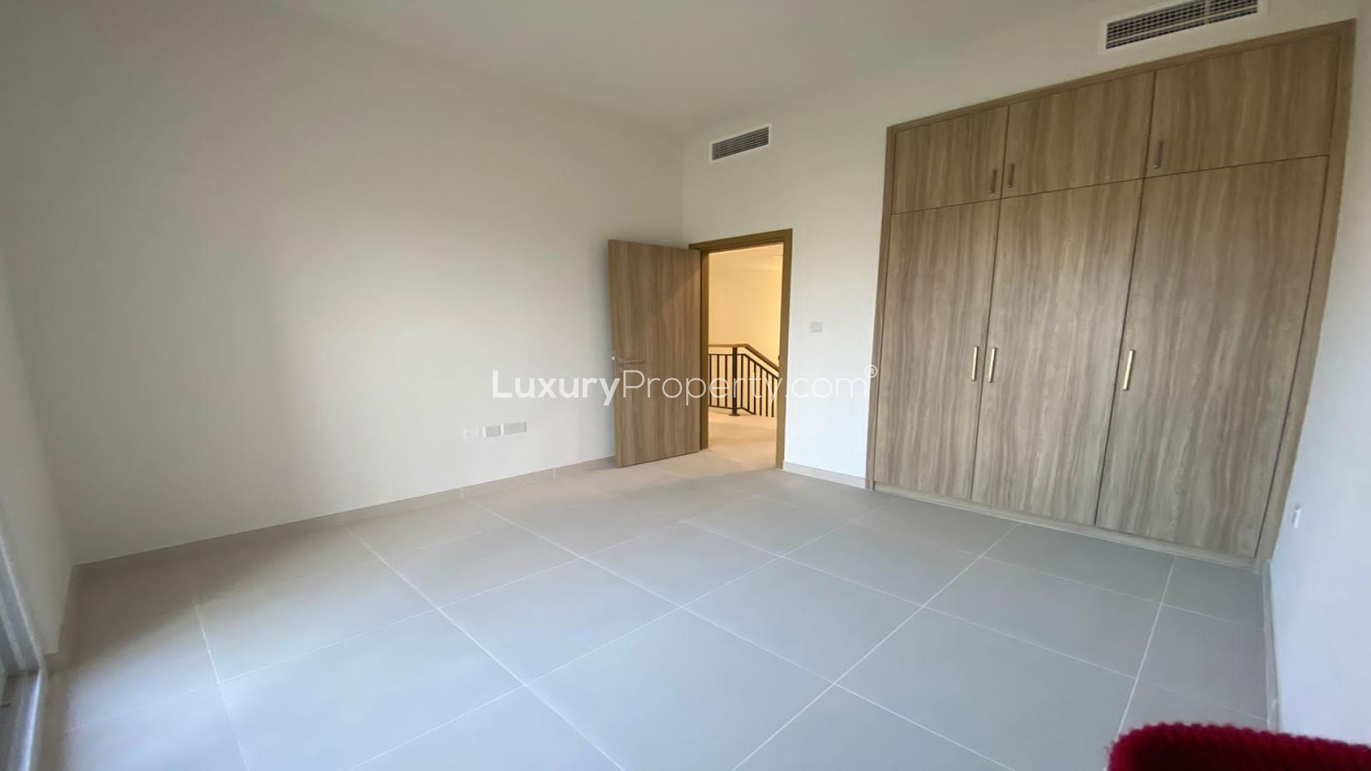 Empty bedroom with built-in closet in Villanova Amaranta townhouse for rent