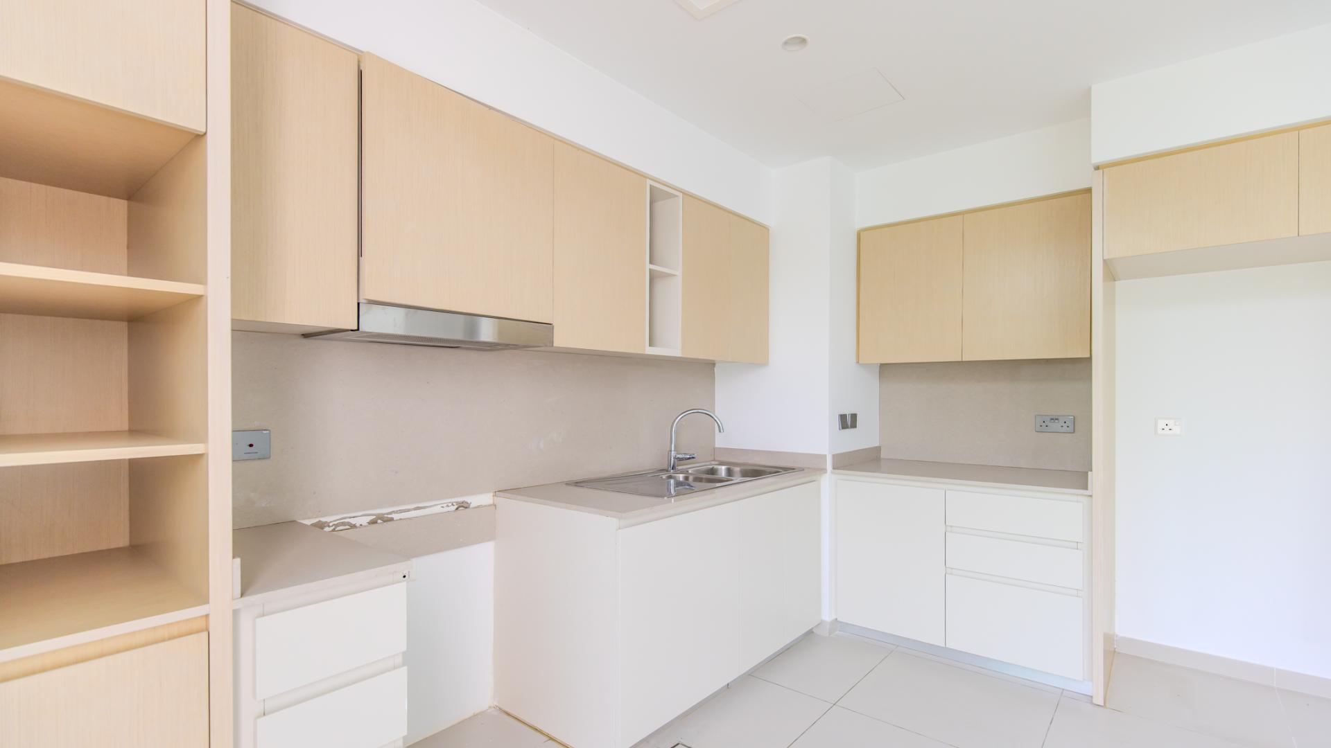 Vacant 3-bedroom townhouse interior with large windows in Arabian Ranches 3, Joy community