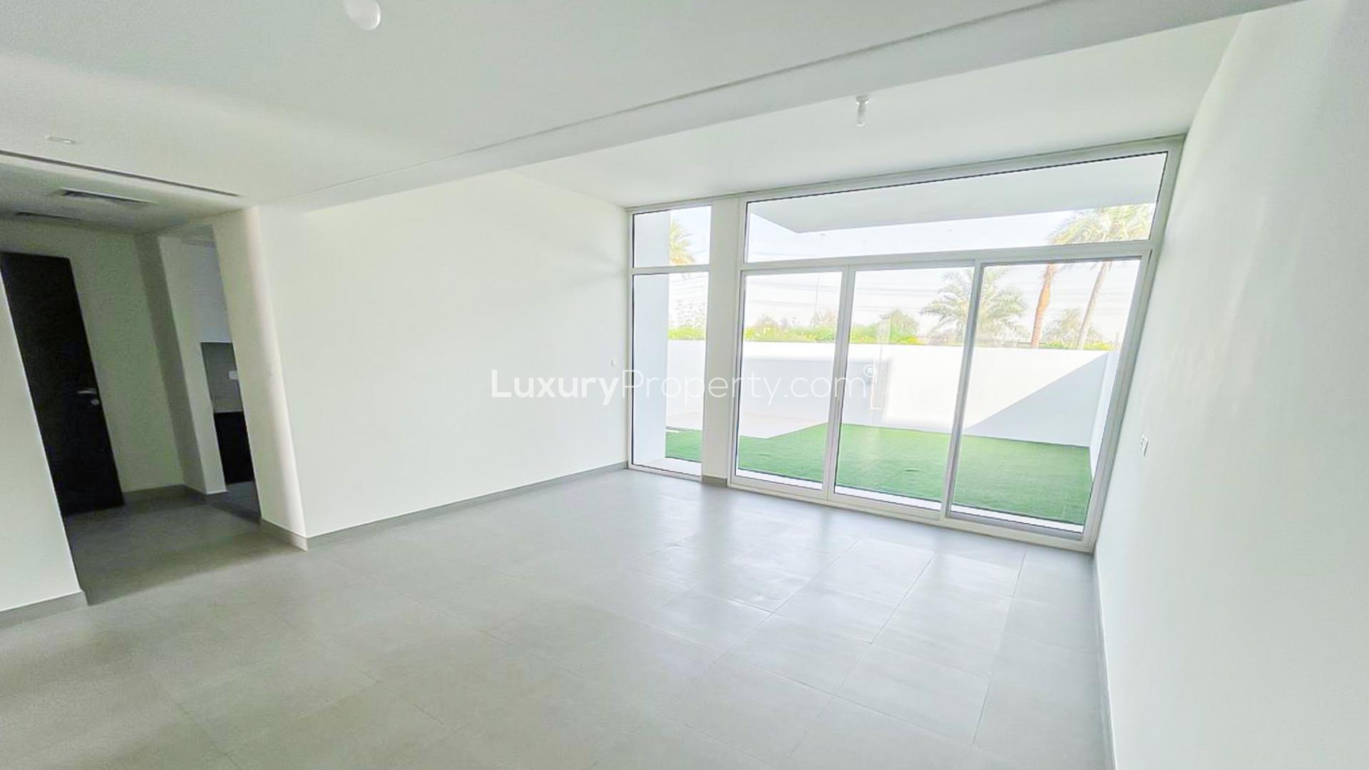 Lush greenery and pathways in Arabella Townhouses 1, Mudon community, Dubai