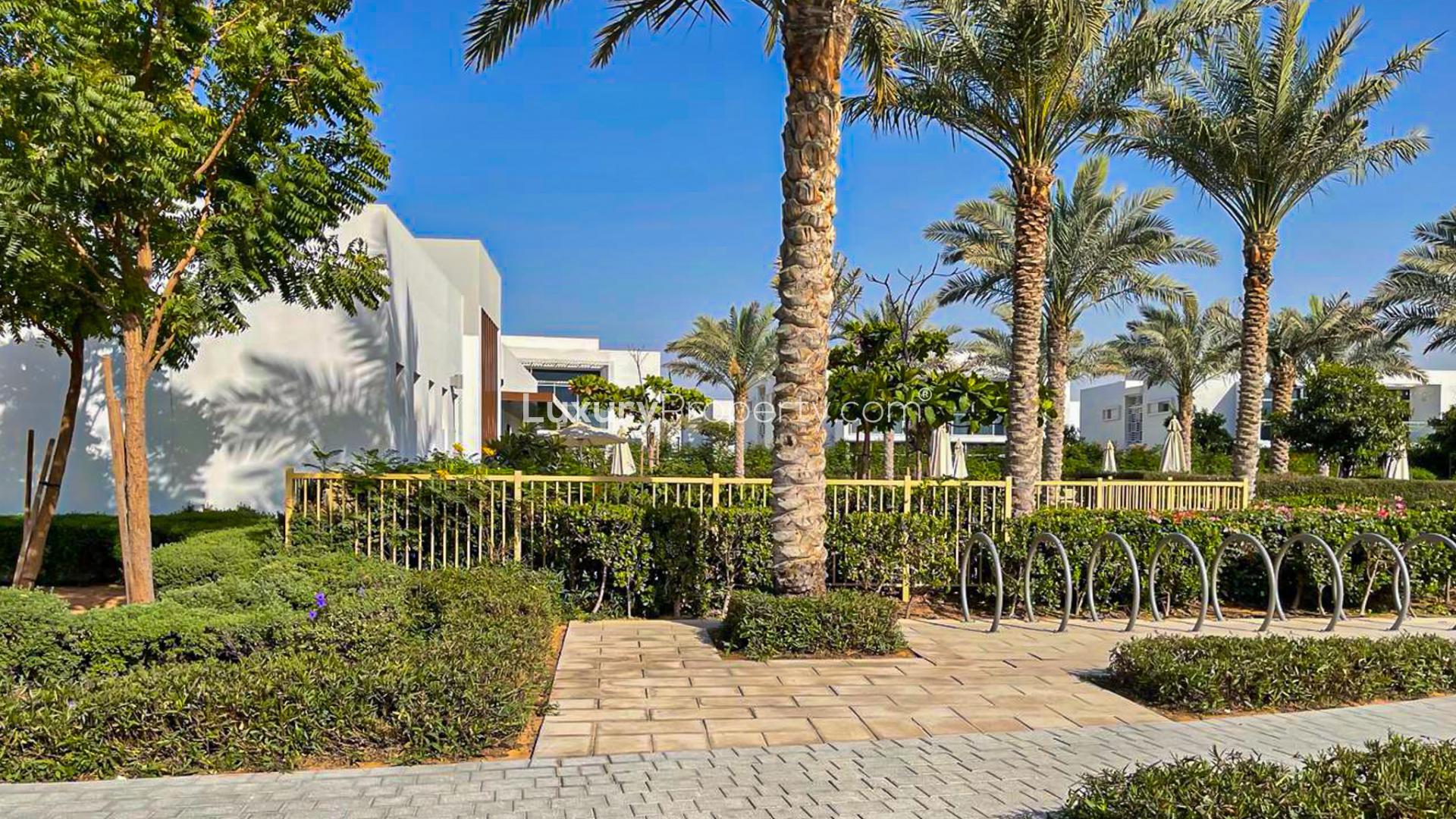 Bright living room with large windows in Arabella Townhouses, Mudon for rent