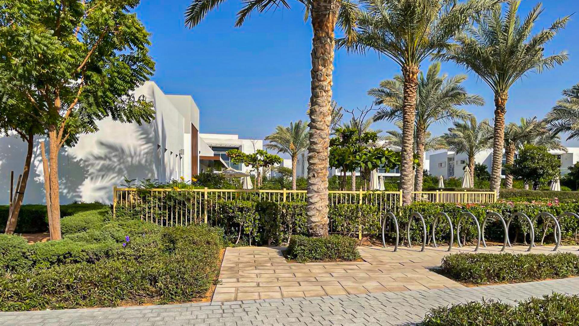 Bright living room with large windows in Arabella Townhouses, Mudon for rent